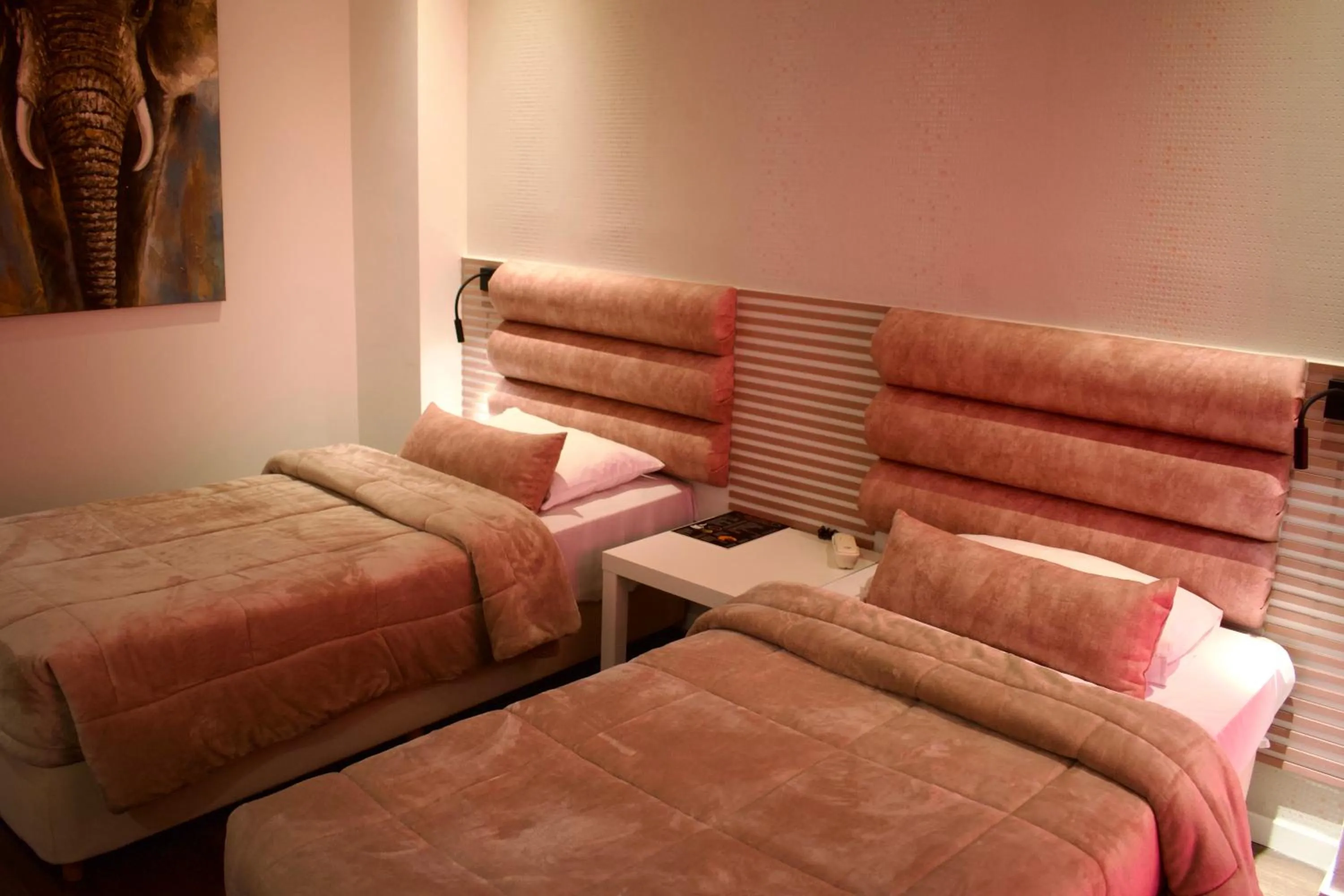 Bed in Minoa Athens Hotel