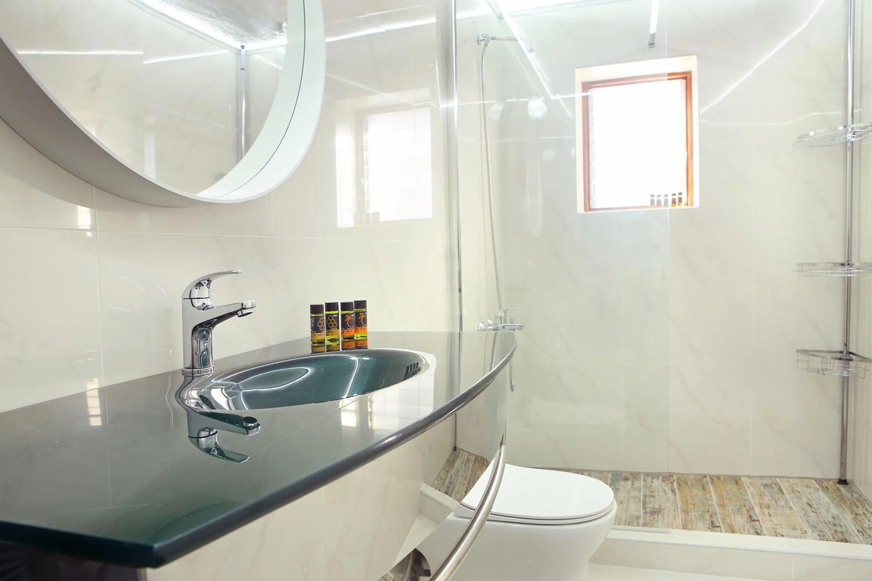 Bathroom in KasteliSuites