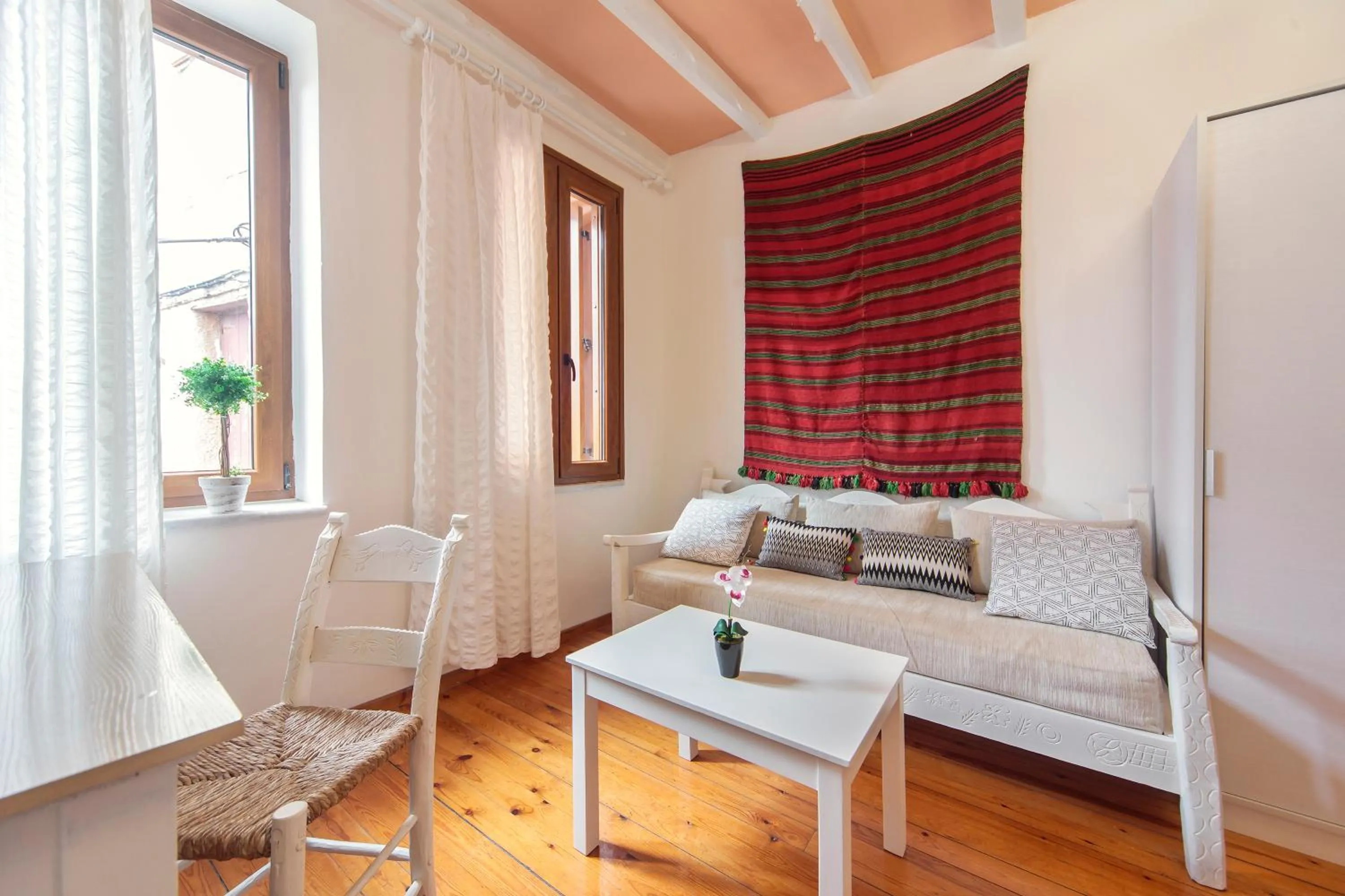 Seating area in KasteliSuites