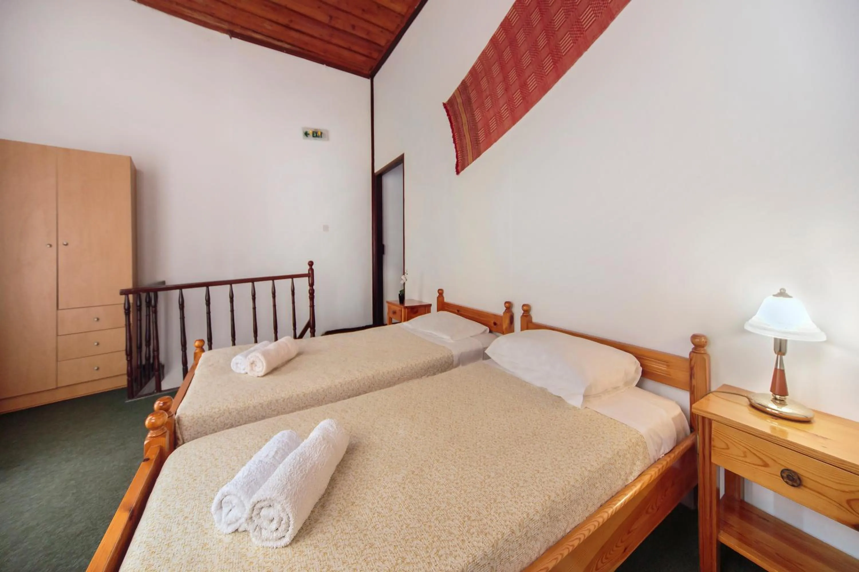 Bedroom in KasteliSuites