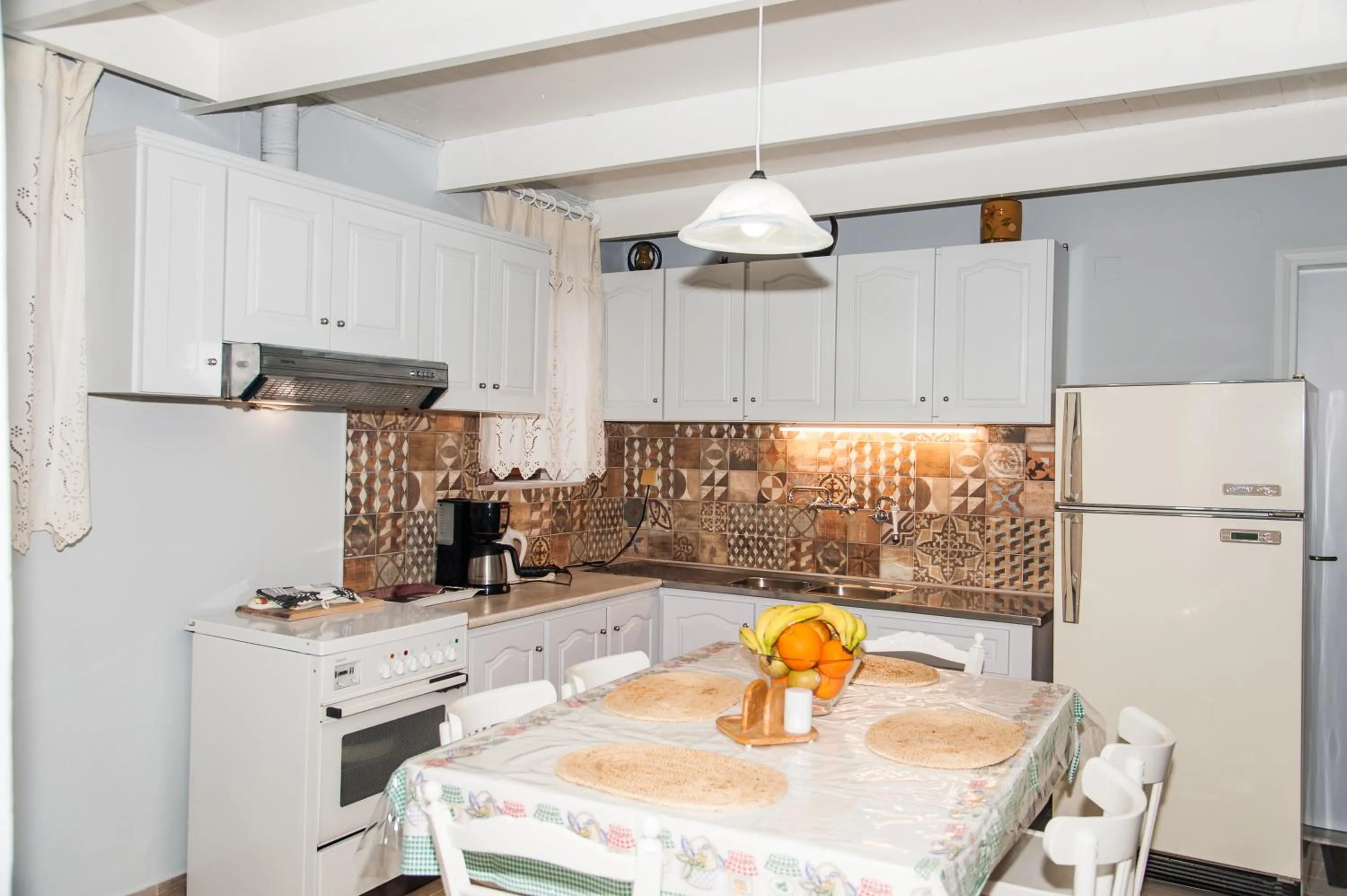 Kitchen or kitchenette in KasteliSuites