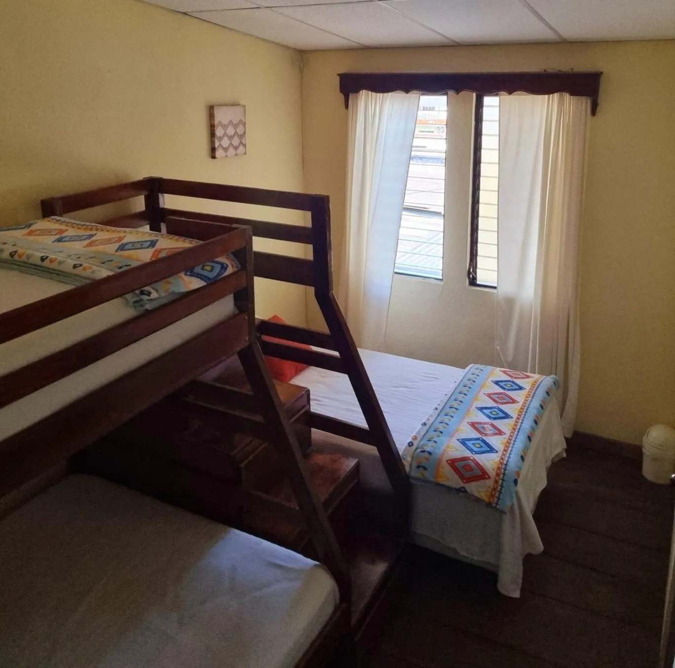 Bed in AZURA HOTEL BOUTIQUE