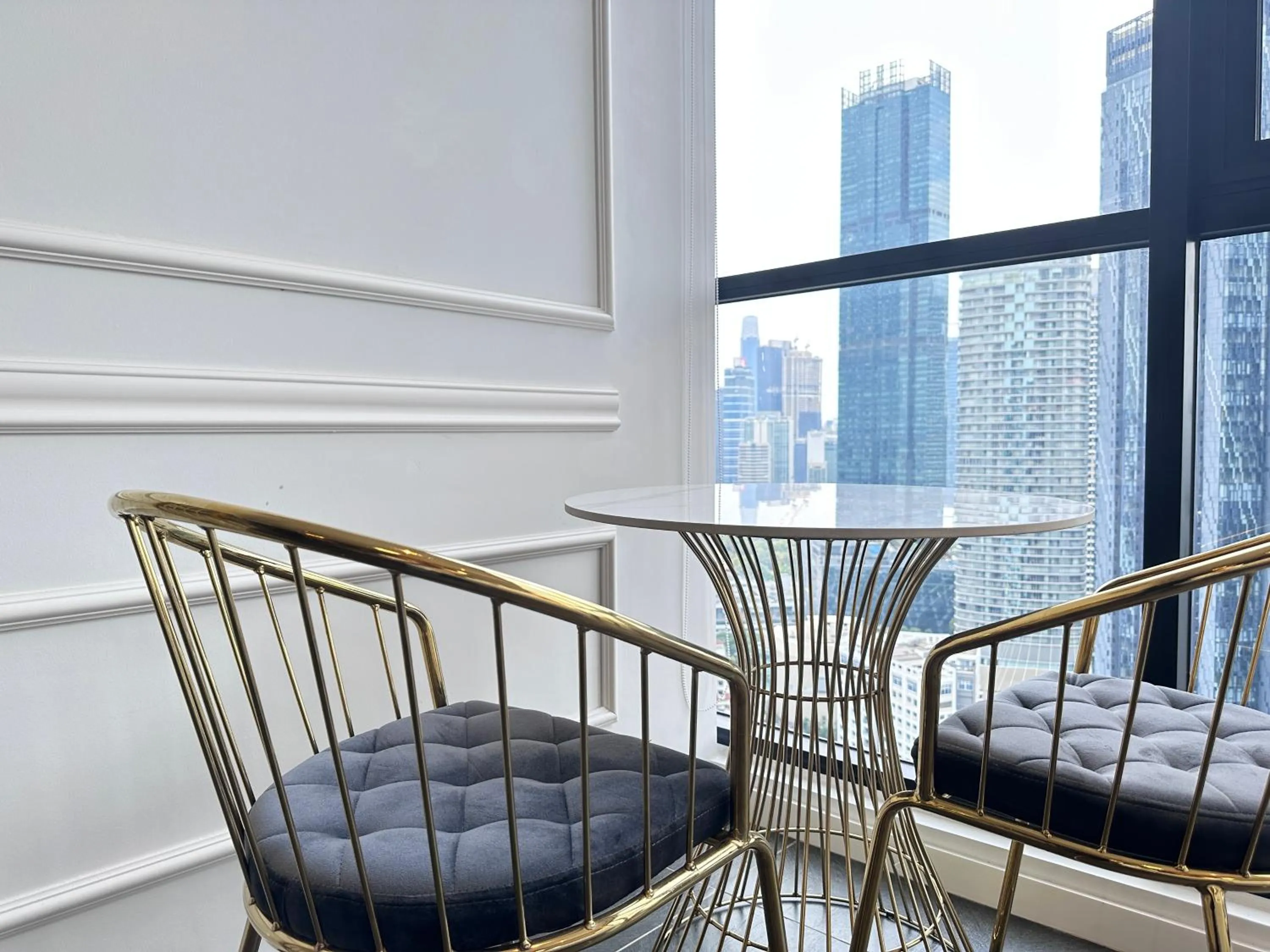 Living room in Scarletz Suites KLCC Twin Tower by Purple Orchid