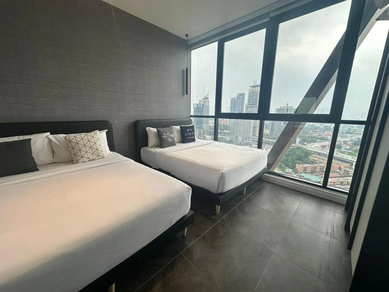 Bed in Scarletz Suites KLCC Twin Tower by Purple Orchid
