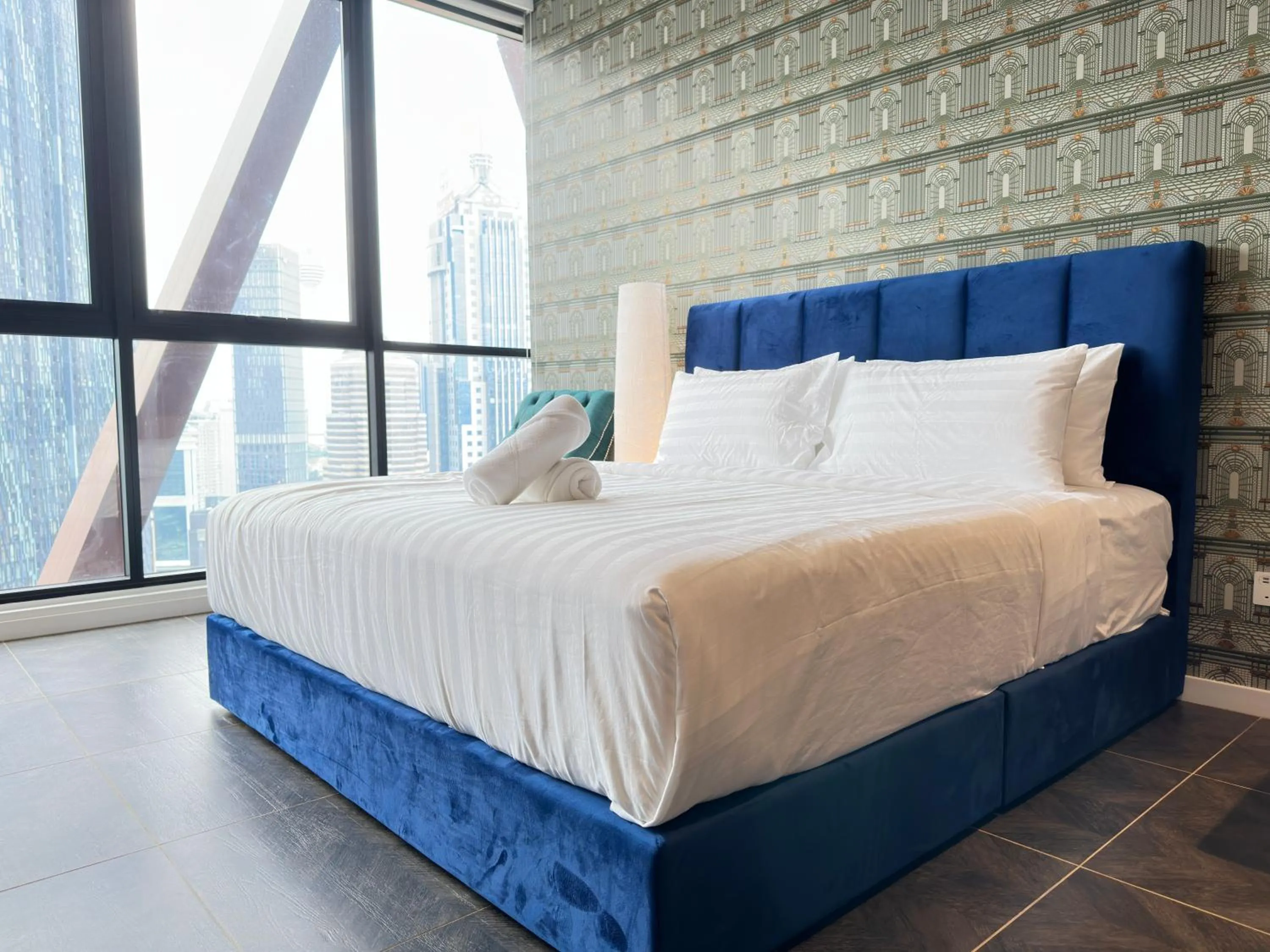 Bed in Scarletz Suites KLCC Twin Tower by Purple Orchid