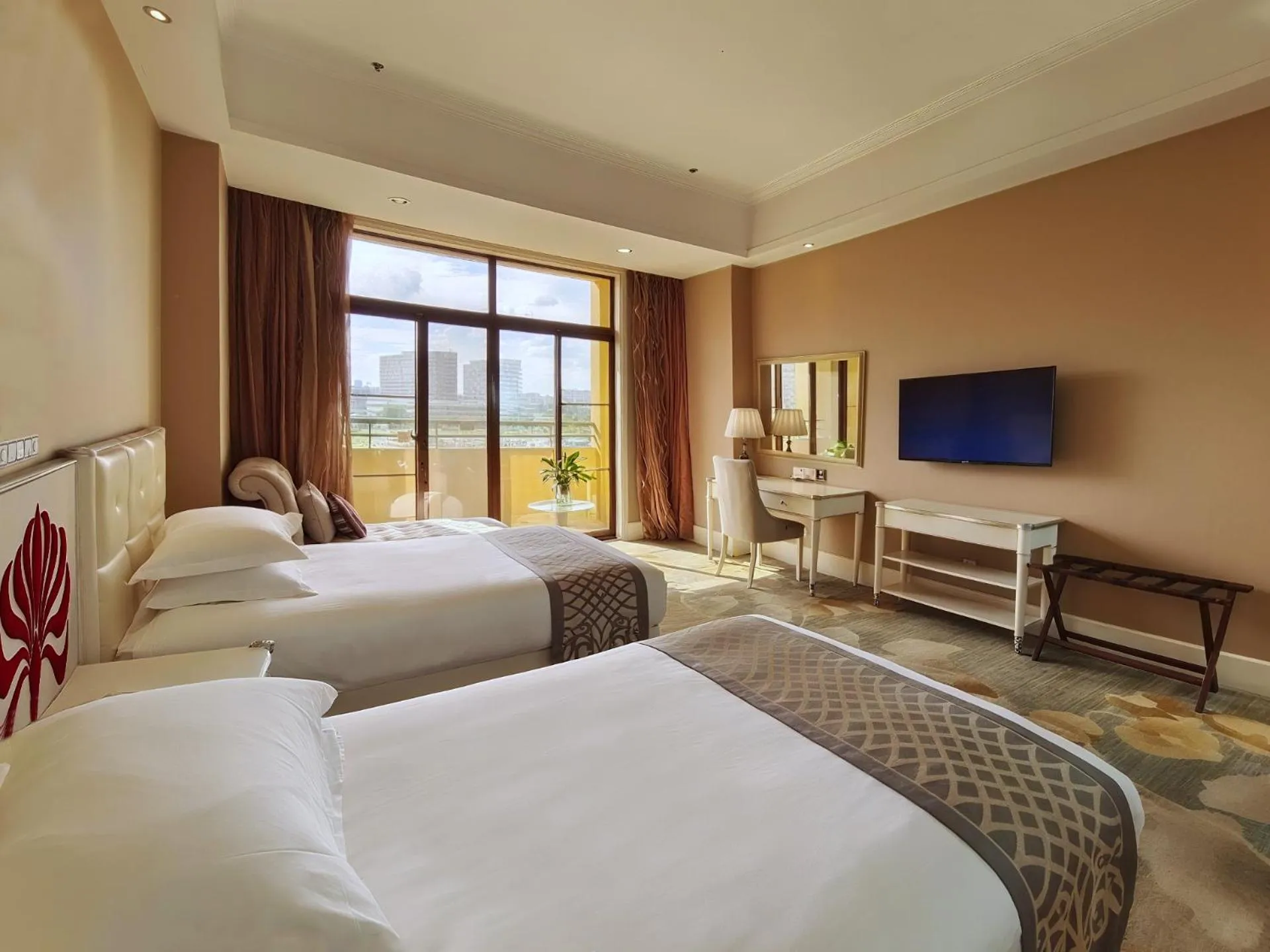 Living room, Bed in Suning Universal Hotel