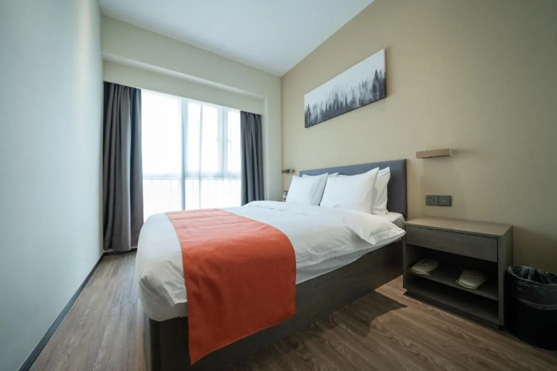 Bed in Shenzhen Kingkey Kingyu Hotel