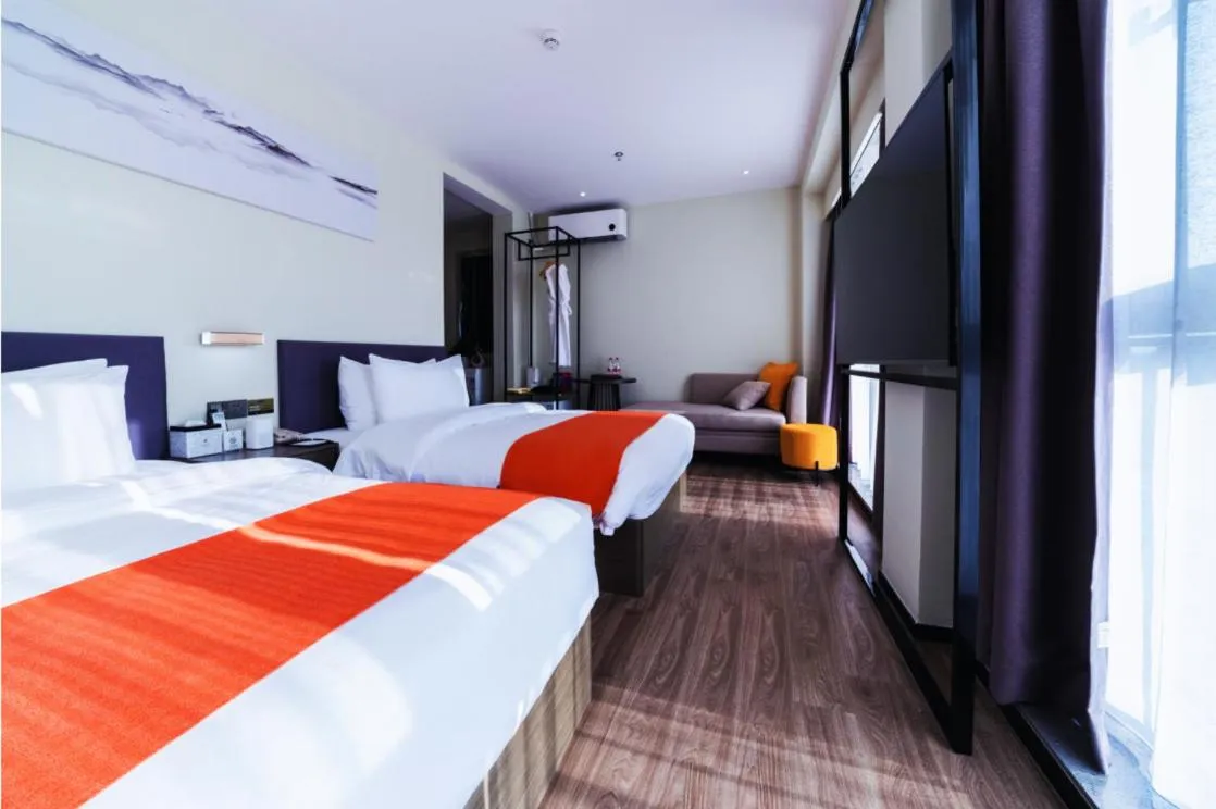 Bed in Shenzhen Kingkey Kingyu Hotel