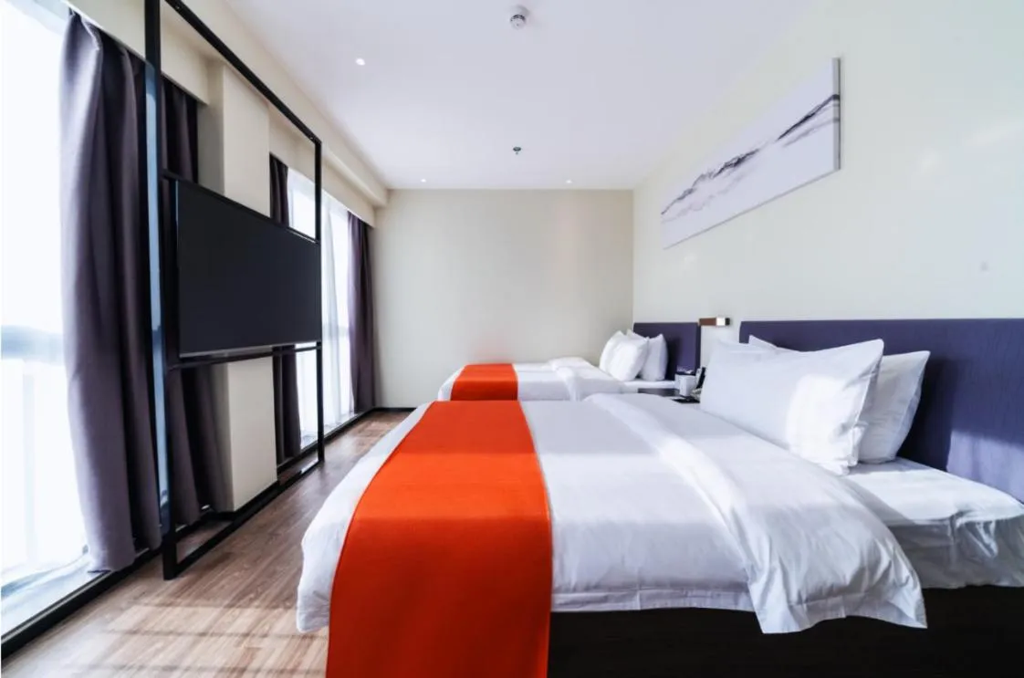 Bed in Shenzhen Kingkey Kingyu Hotel