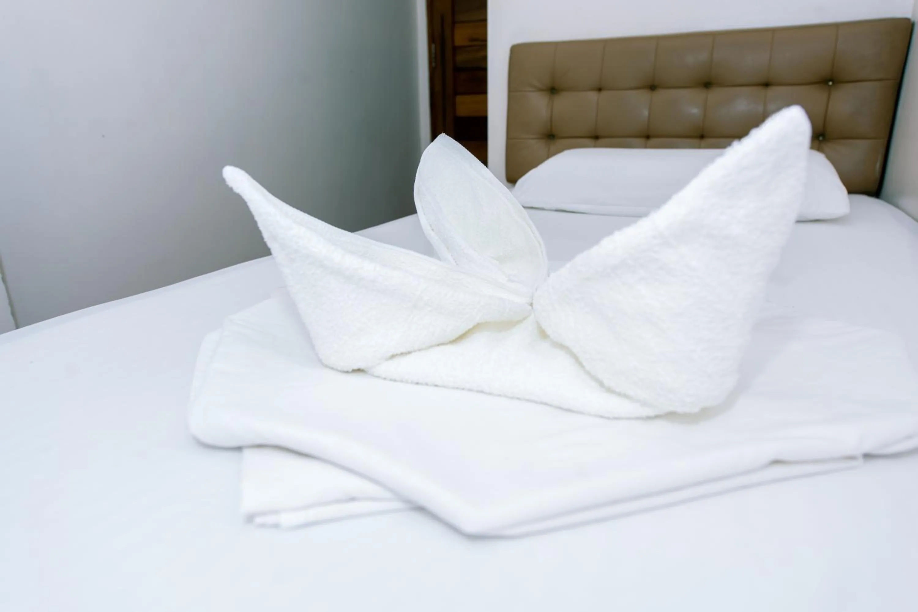 Bed in FB Budgetel Suites