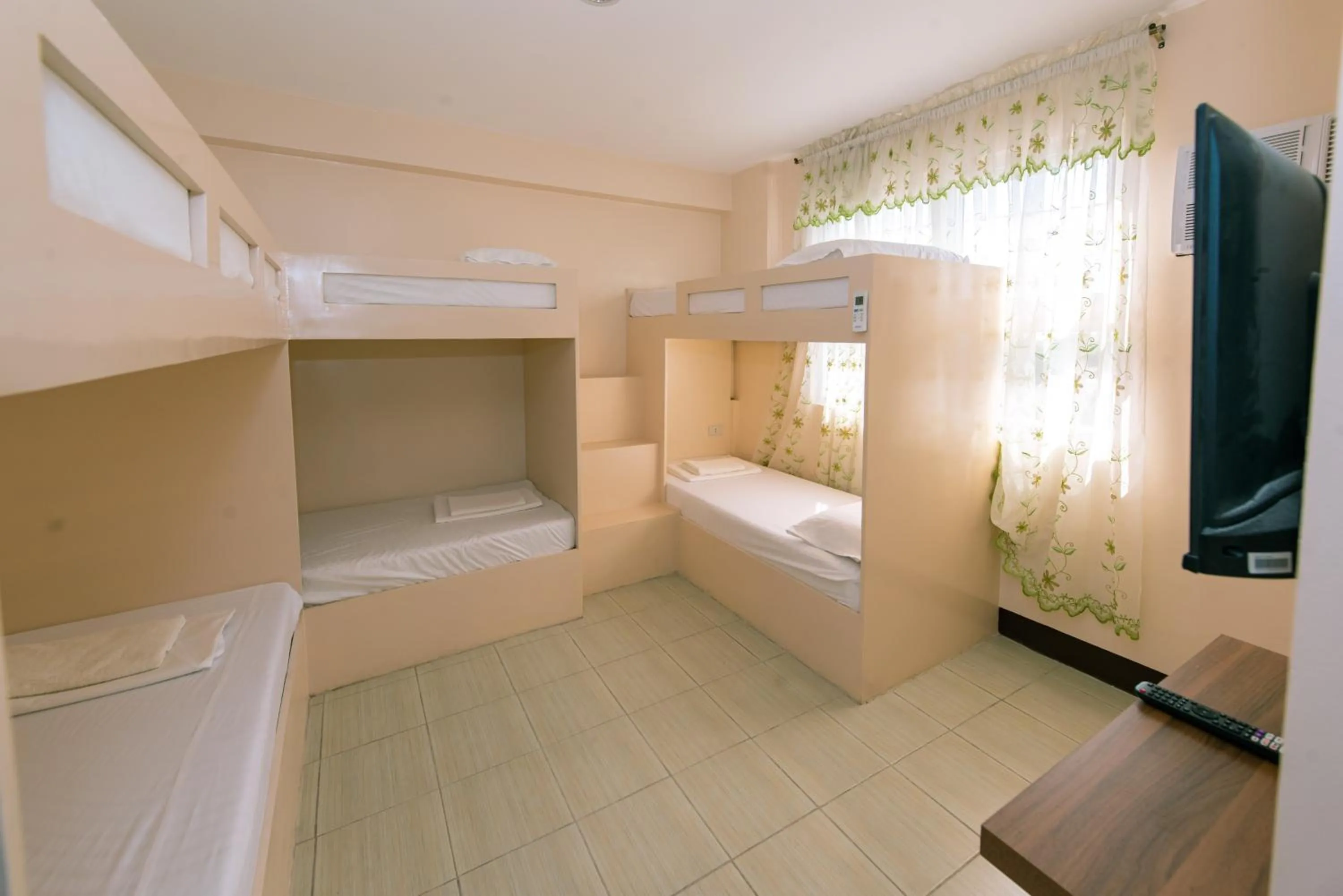 Bed in FB Budgetel Suites