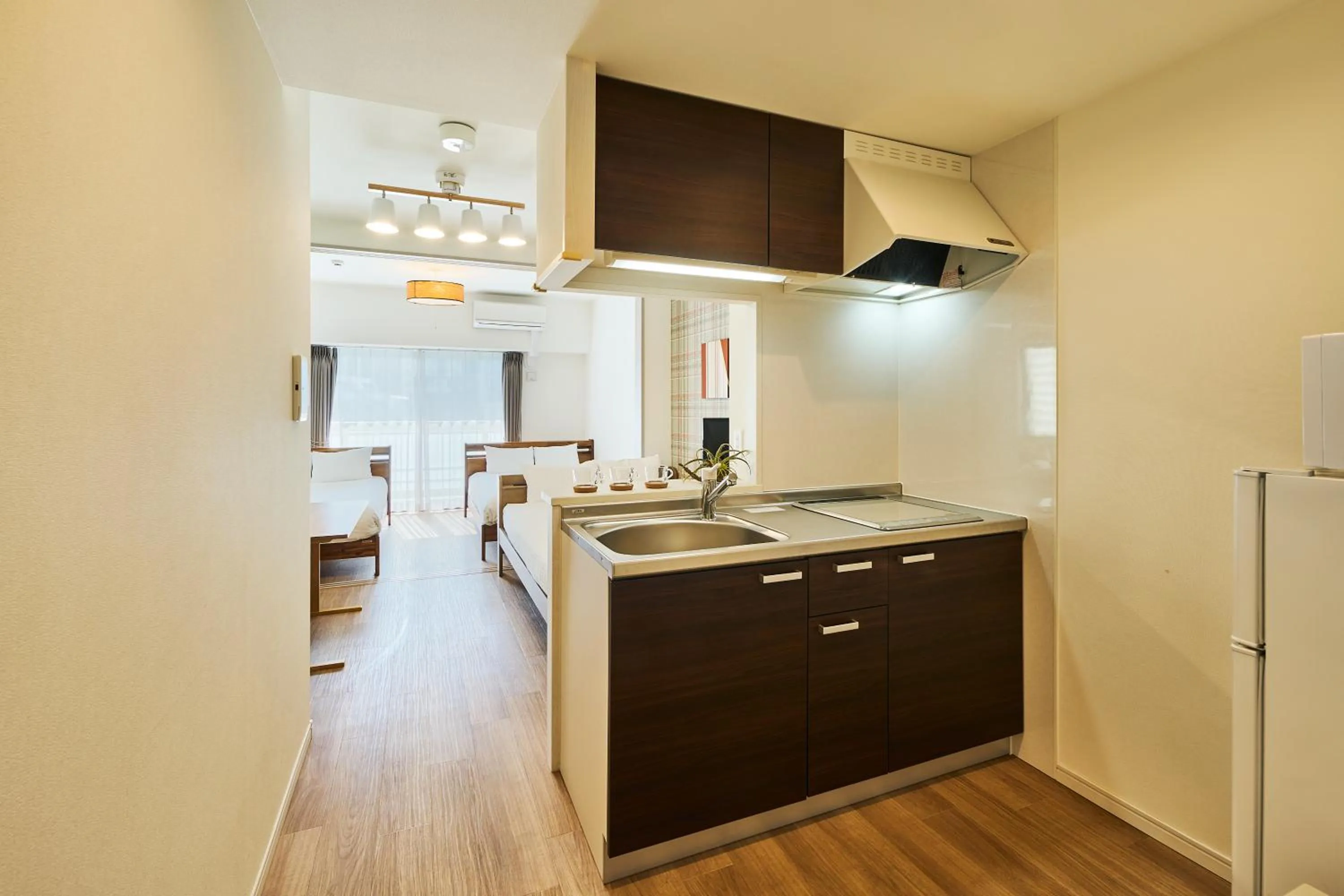 Kitchen or kitchenette in ALFACIO RIVERSIDE STAY HAKATA