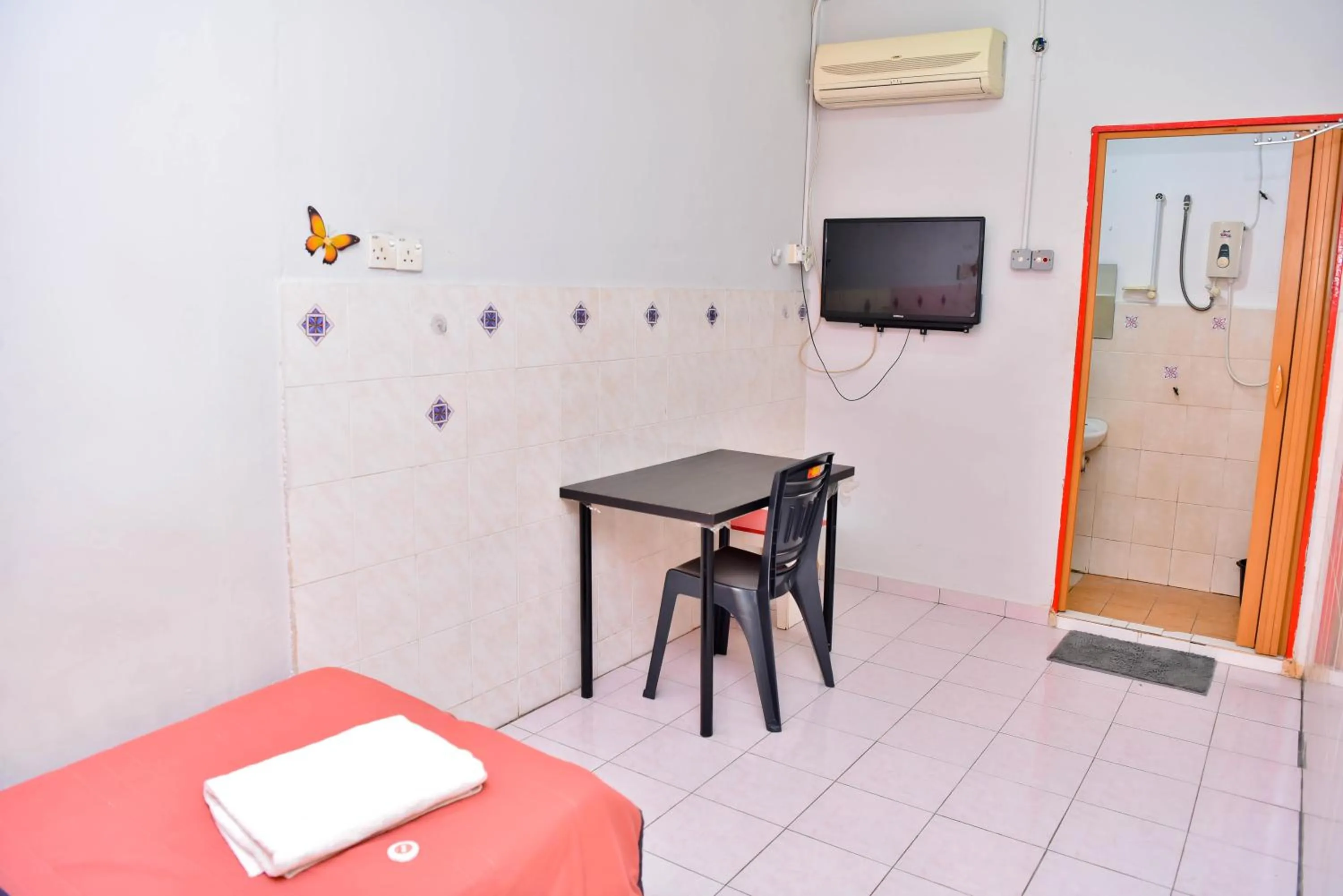 Bed in T FAMILY HOTEL