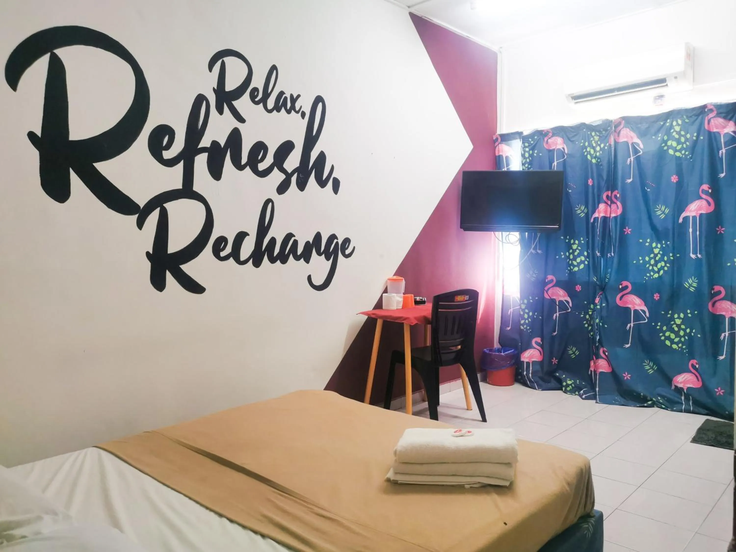 Bed in T FAMILY HOTEL