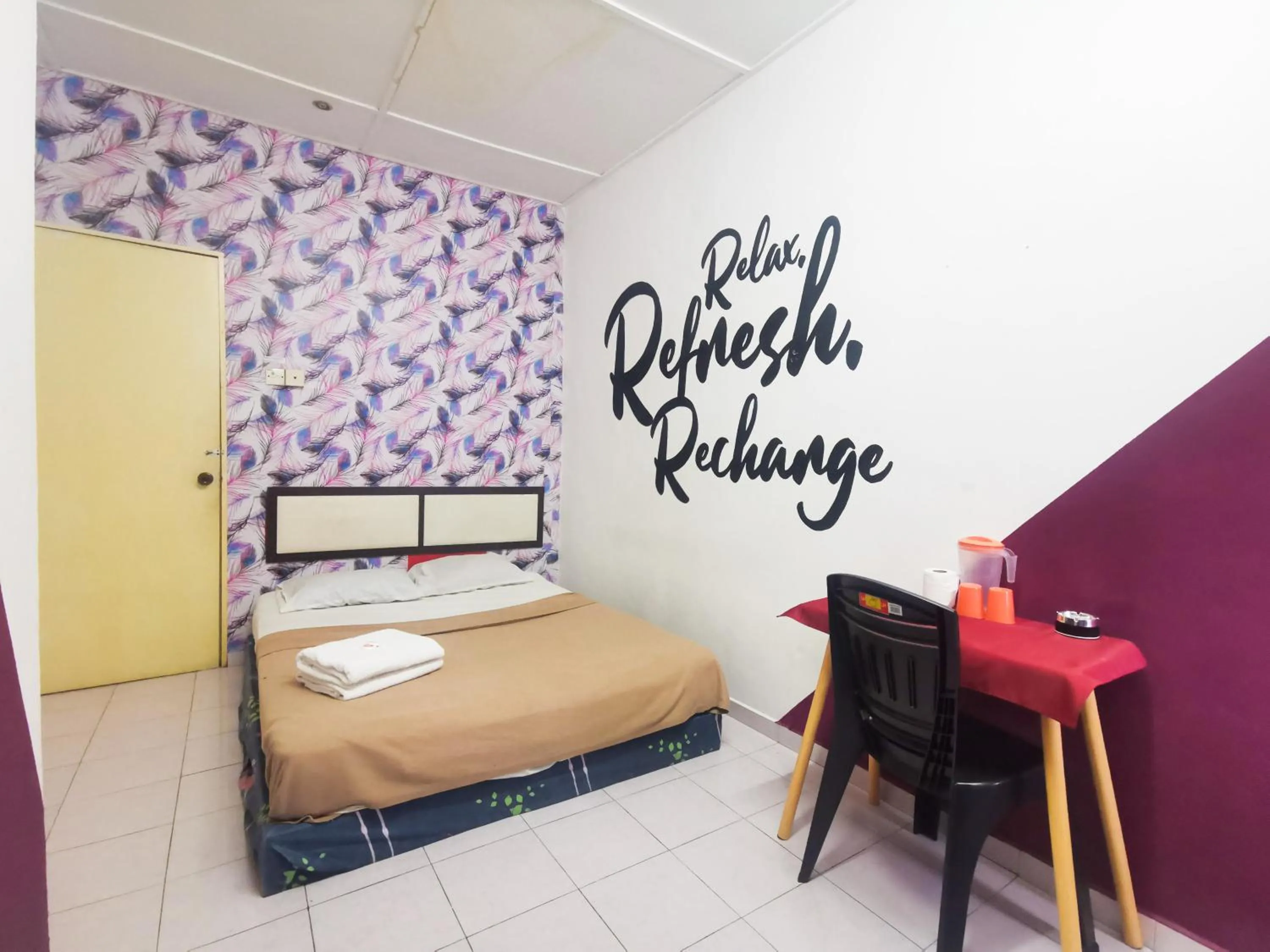 Bed in T FAMILY HOTEL