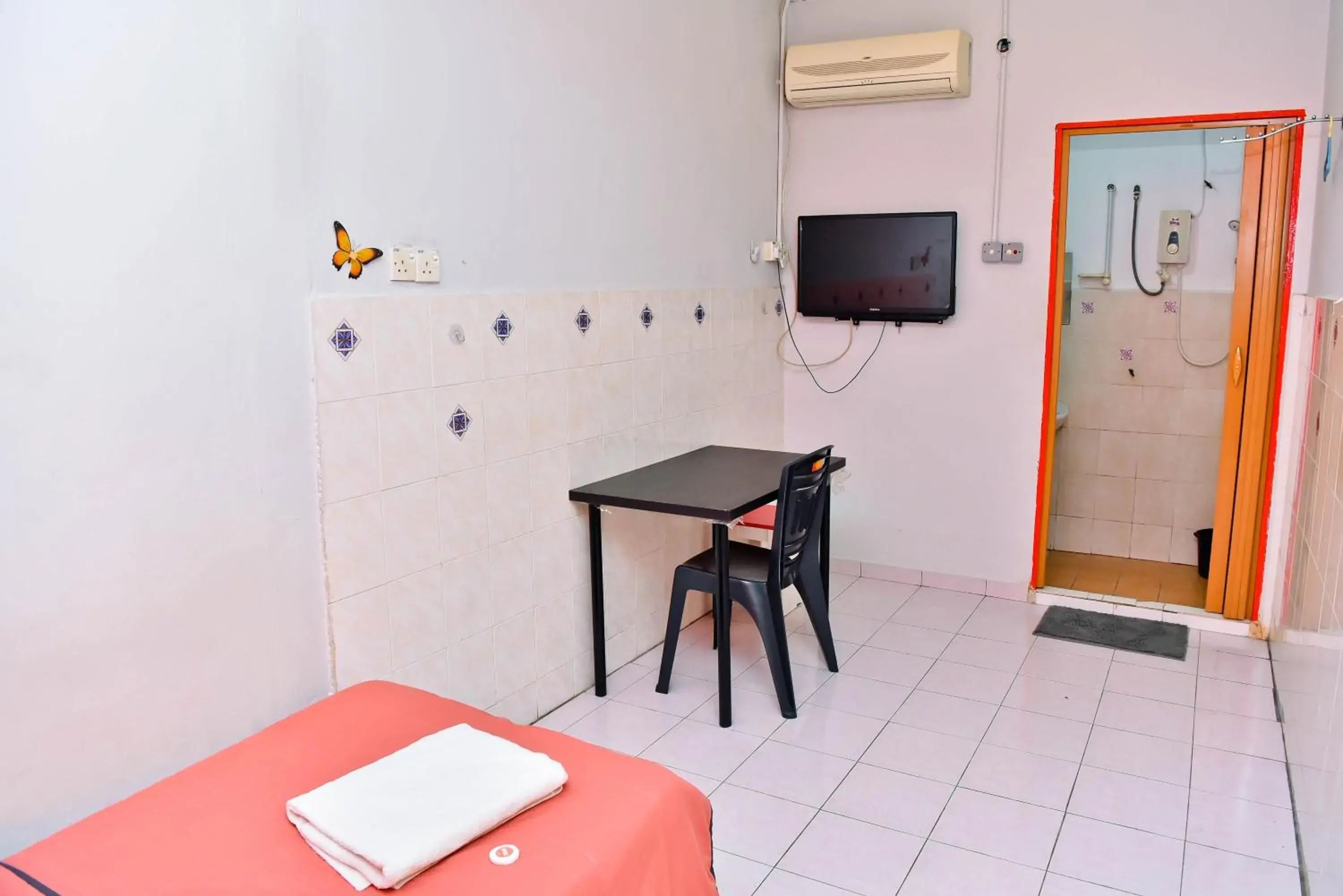 Bed in T FAMILY HOTEL Bed in T FAMILY HOTEL