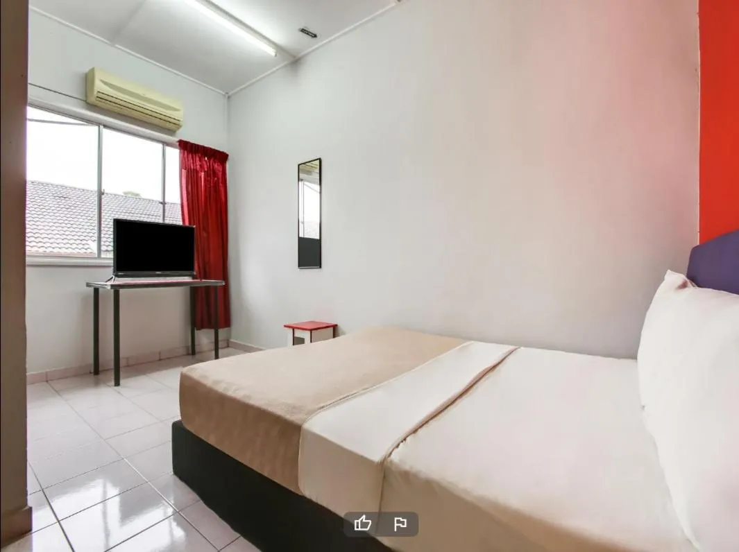 Bed in T FAMILY HOTEL