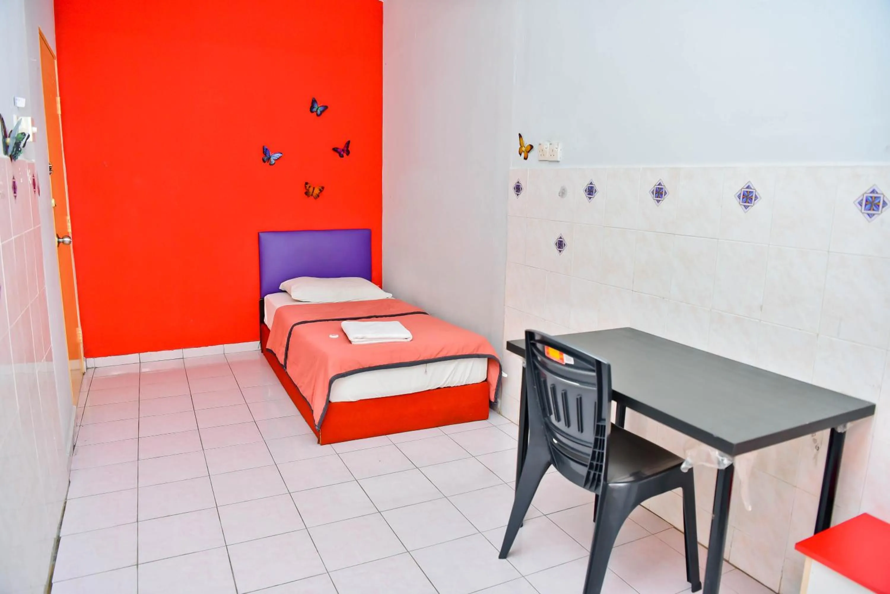 Bed in T FAMILY HOTEL