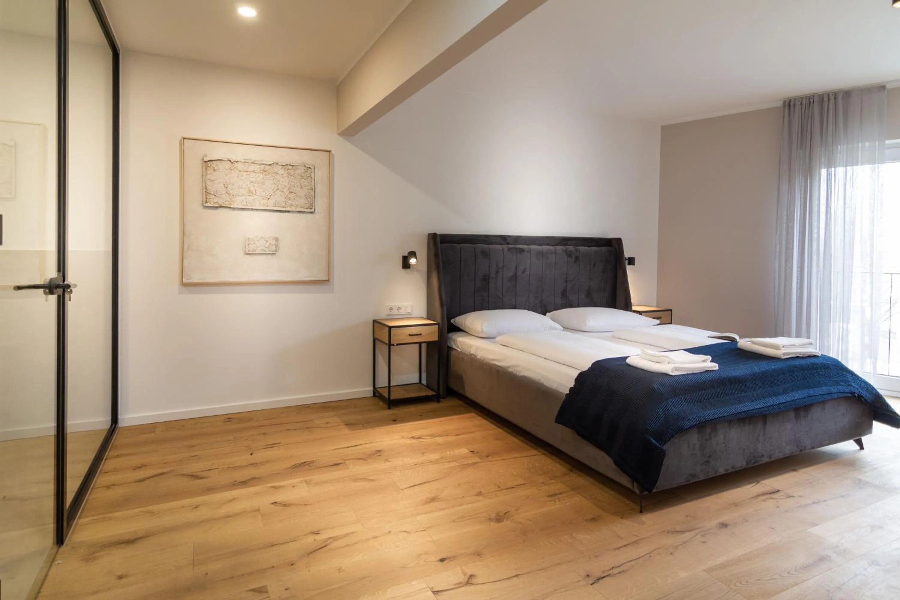 Bed in Sleep Inn Medienhafen Suites