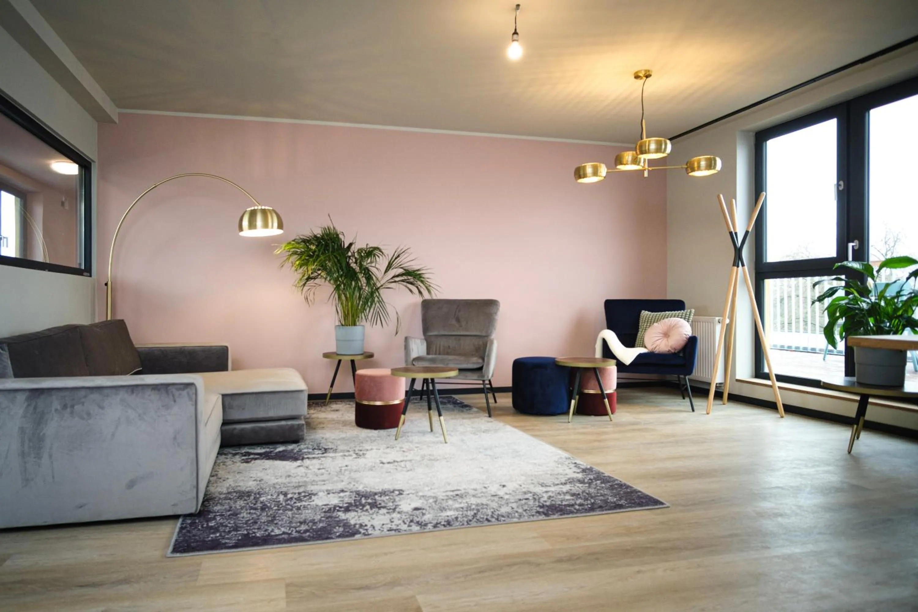 Communal lounge/ TV room in The Base Berlin ONE