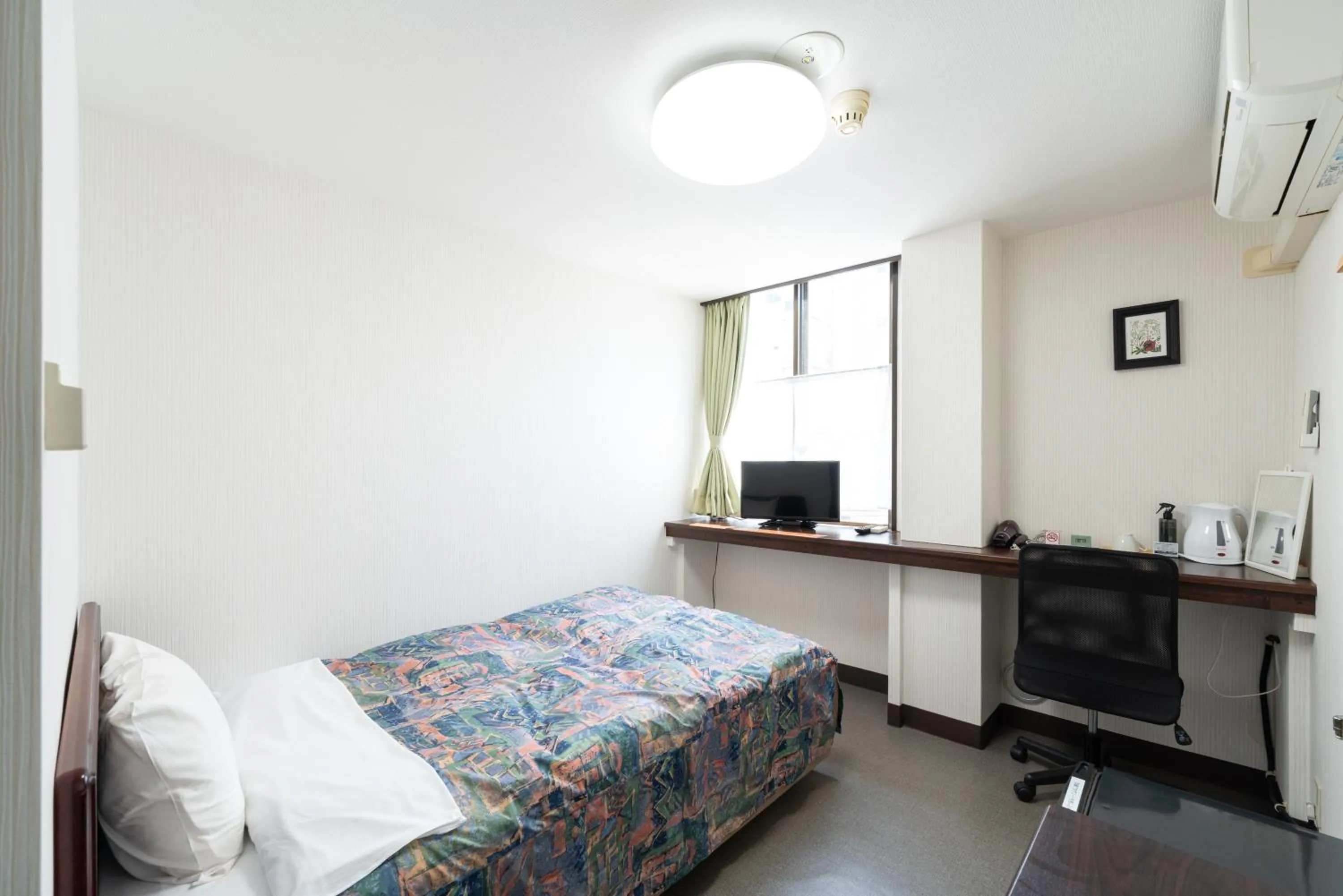 Photo of the whole room, Bed in Travel Inn Kofu