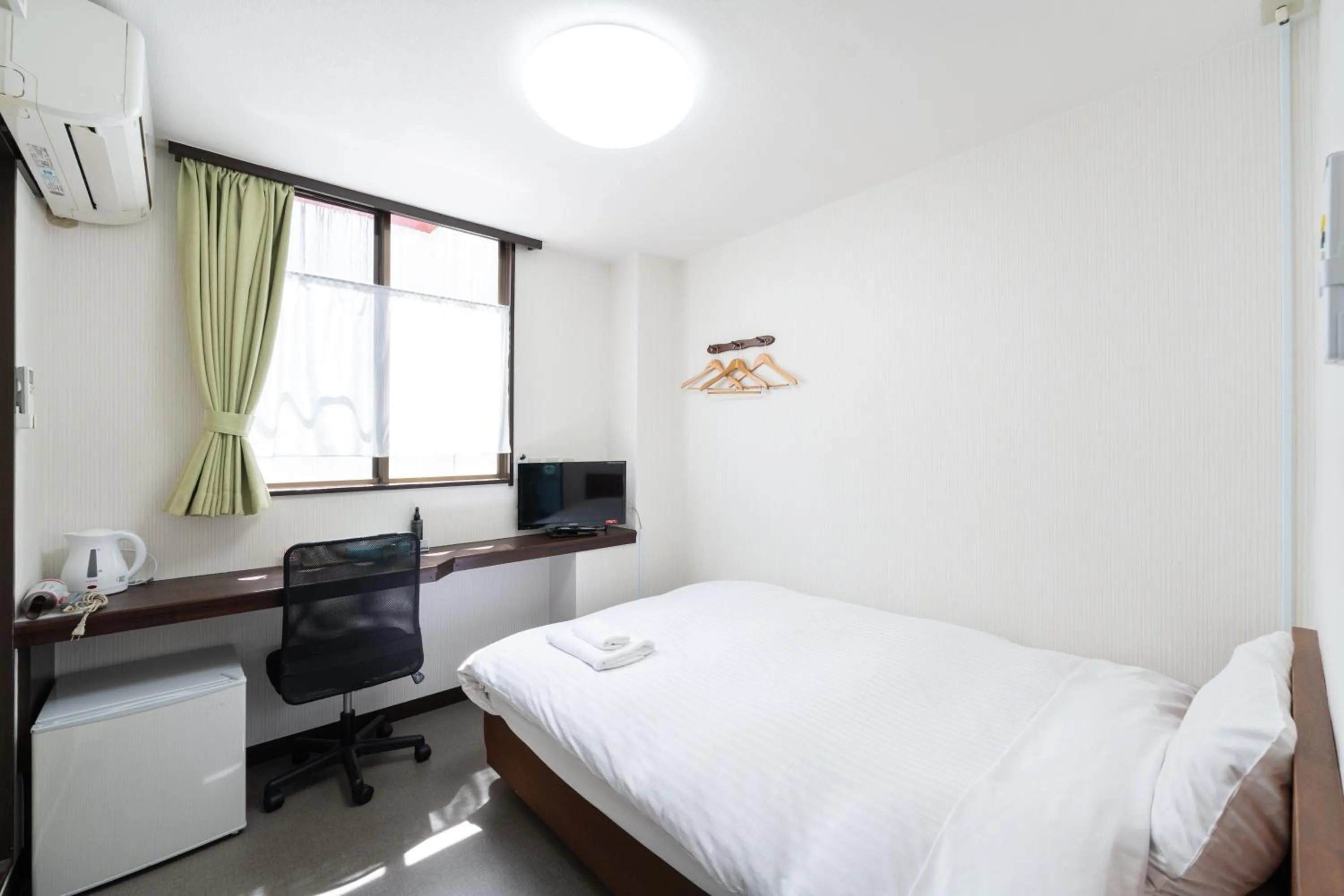 Photo of the whole room, Bed in Travel Inn Kofu