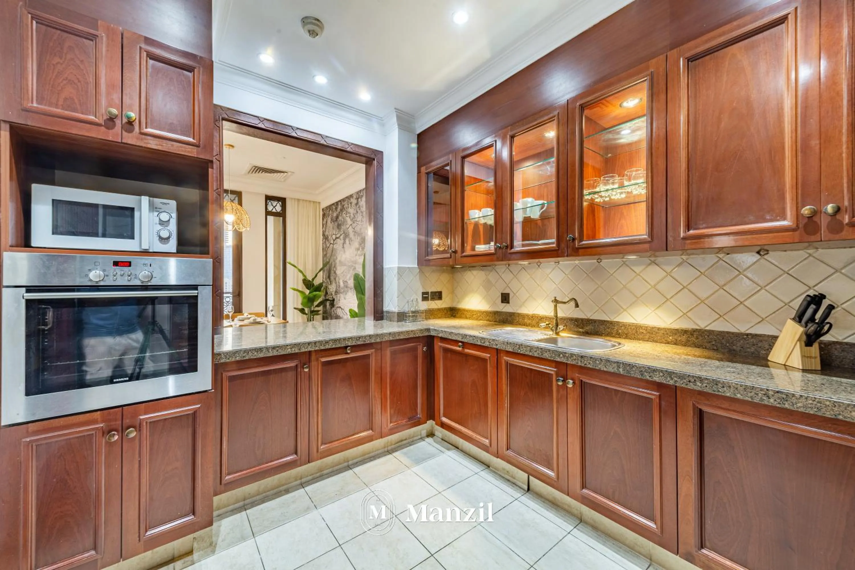 kitchen in Manzil - Cozy 2BR Penthouse with Private Terrace and Full Burj View in Downtown