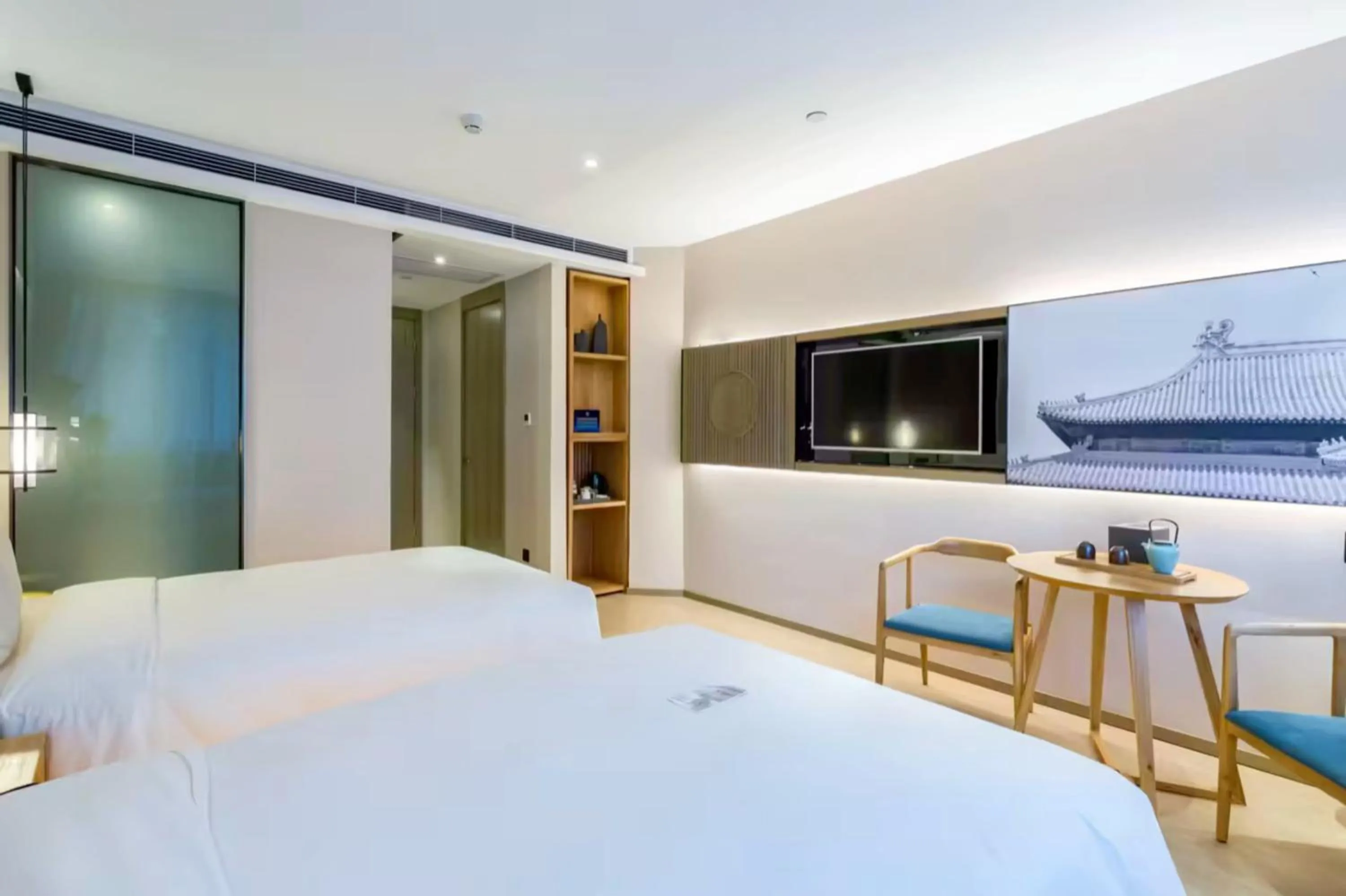 Photo of the whole room, Bed in Atour Hotel Beijing Fuxingmen