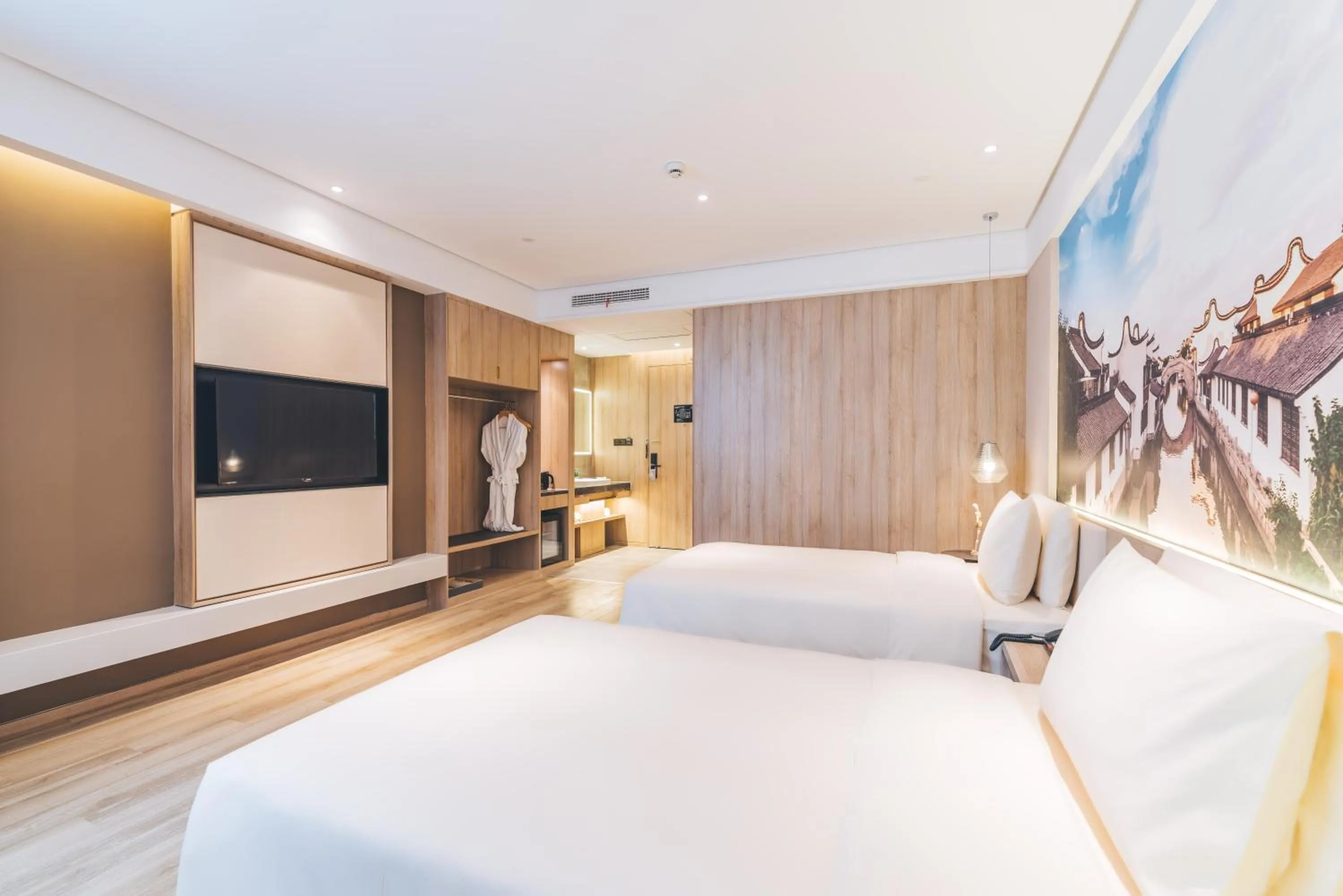 Photo of the whole room, Bed in Atour Hotel Shanghai New International Expo Center Maglev Station