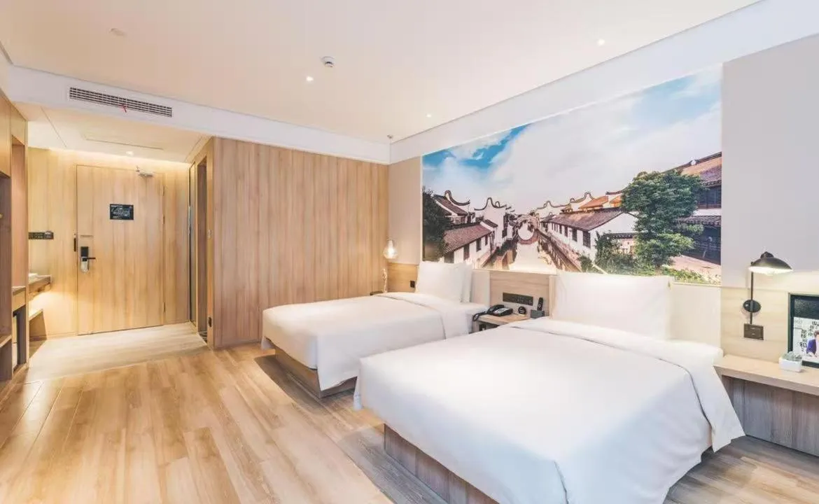 Bed in Atour Hotel Shanghai New International Expo Center Maglev Station