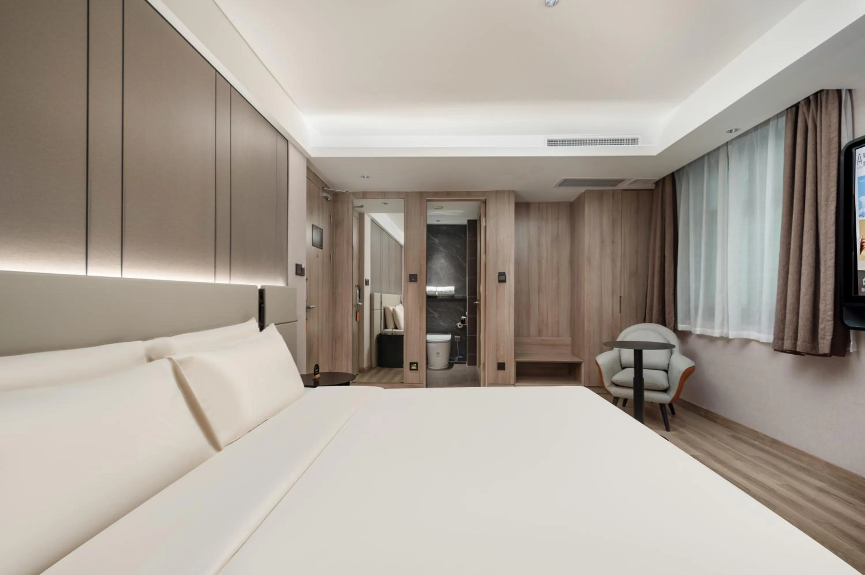 Bed in Atour Hotel Qingdao Olympic Sailing Center May Fourth Square