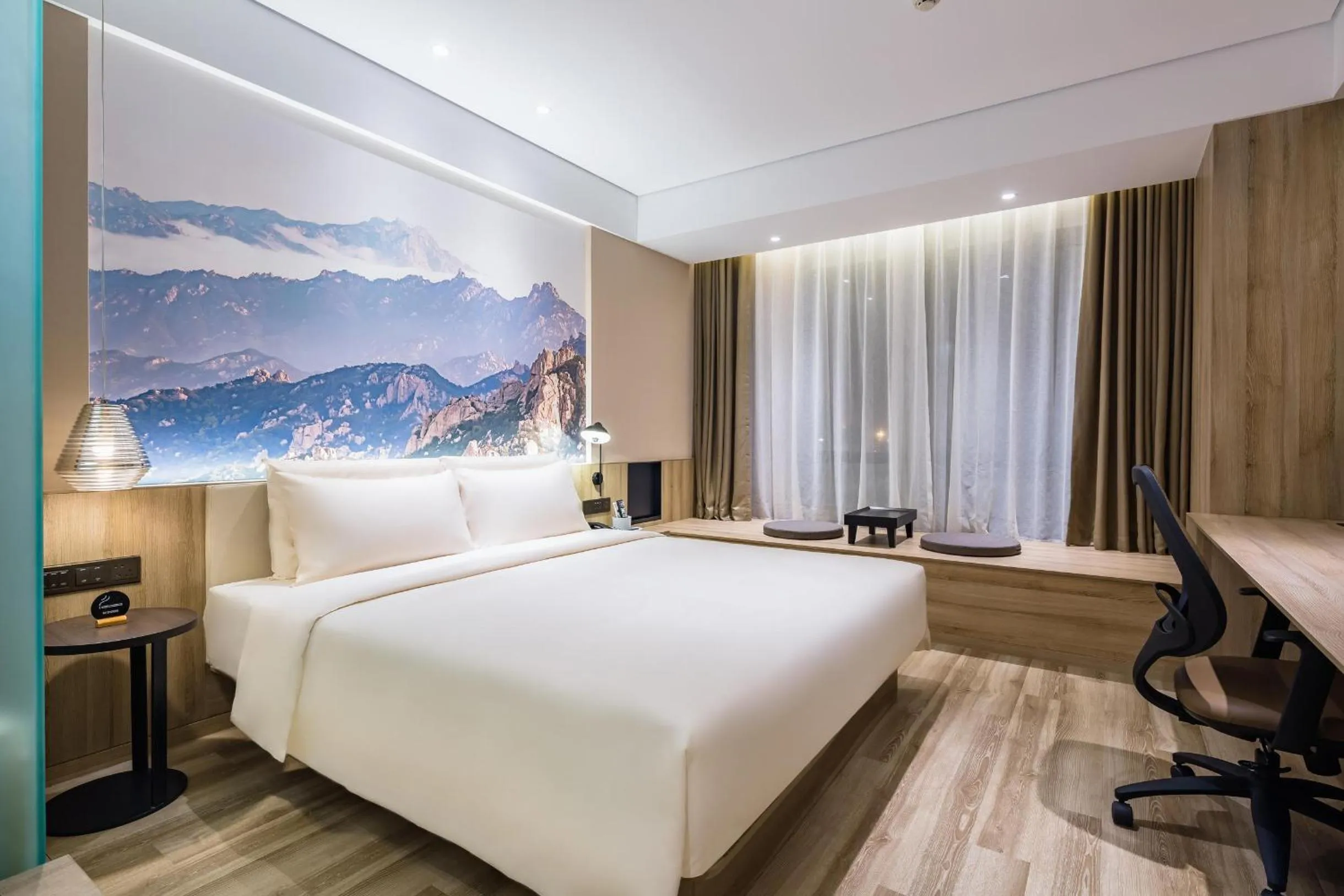 Bed in Atour Hotel Qingdao Fuzhou Road Sakura Town