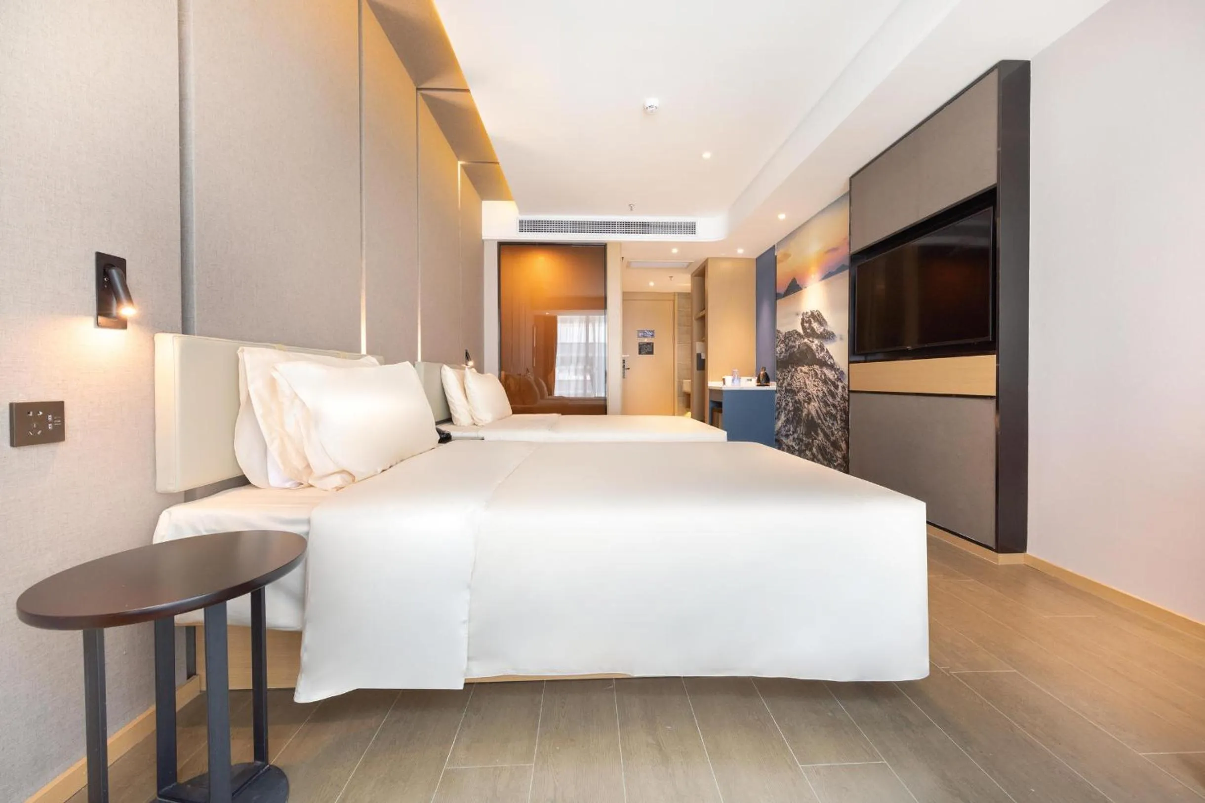 Bed in Atour Hotel Shenzhen Shajing International Convention and Exhibition Center