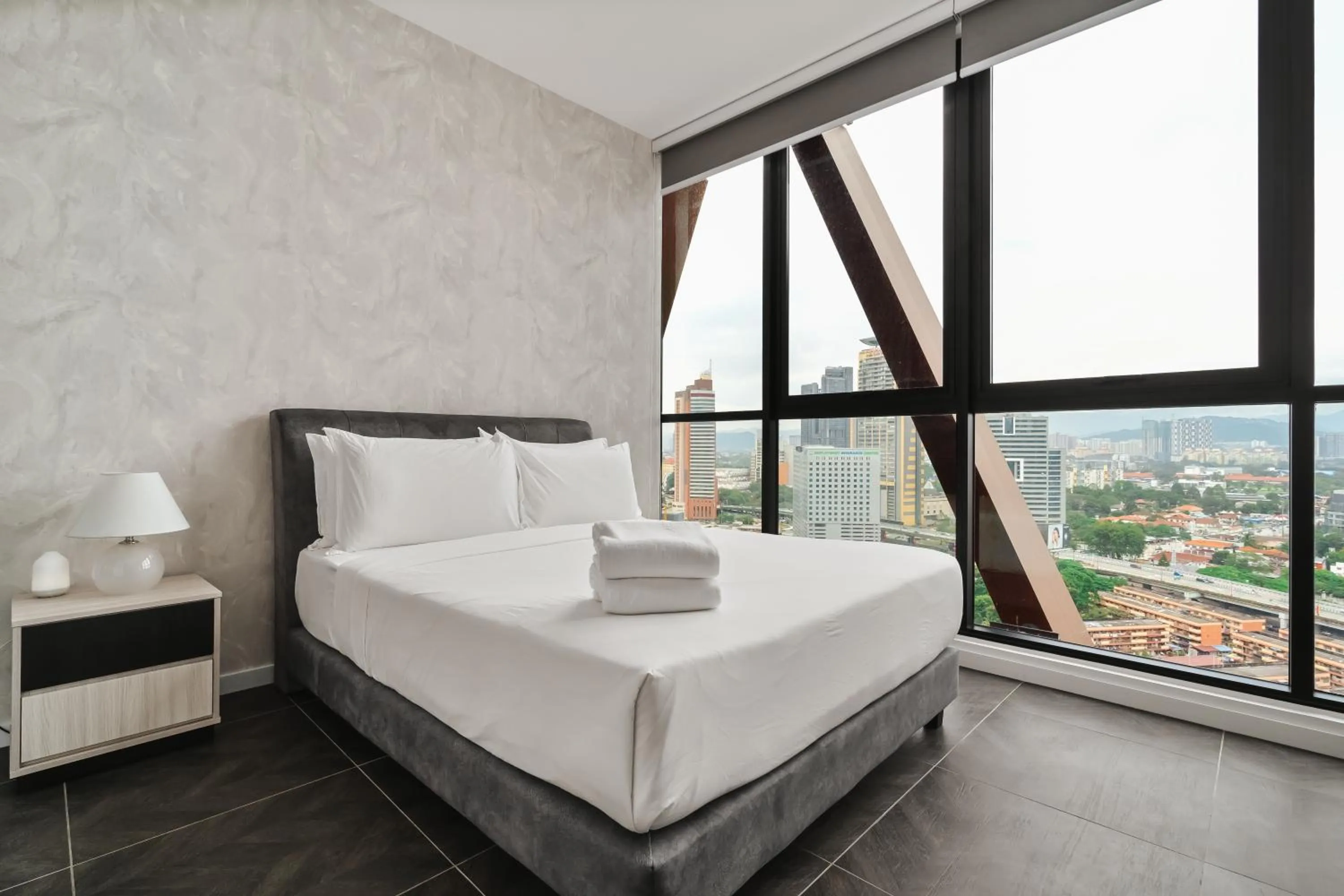 Bed in Scarletz KLCC Apartments by soulasia