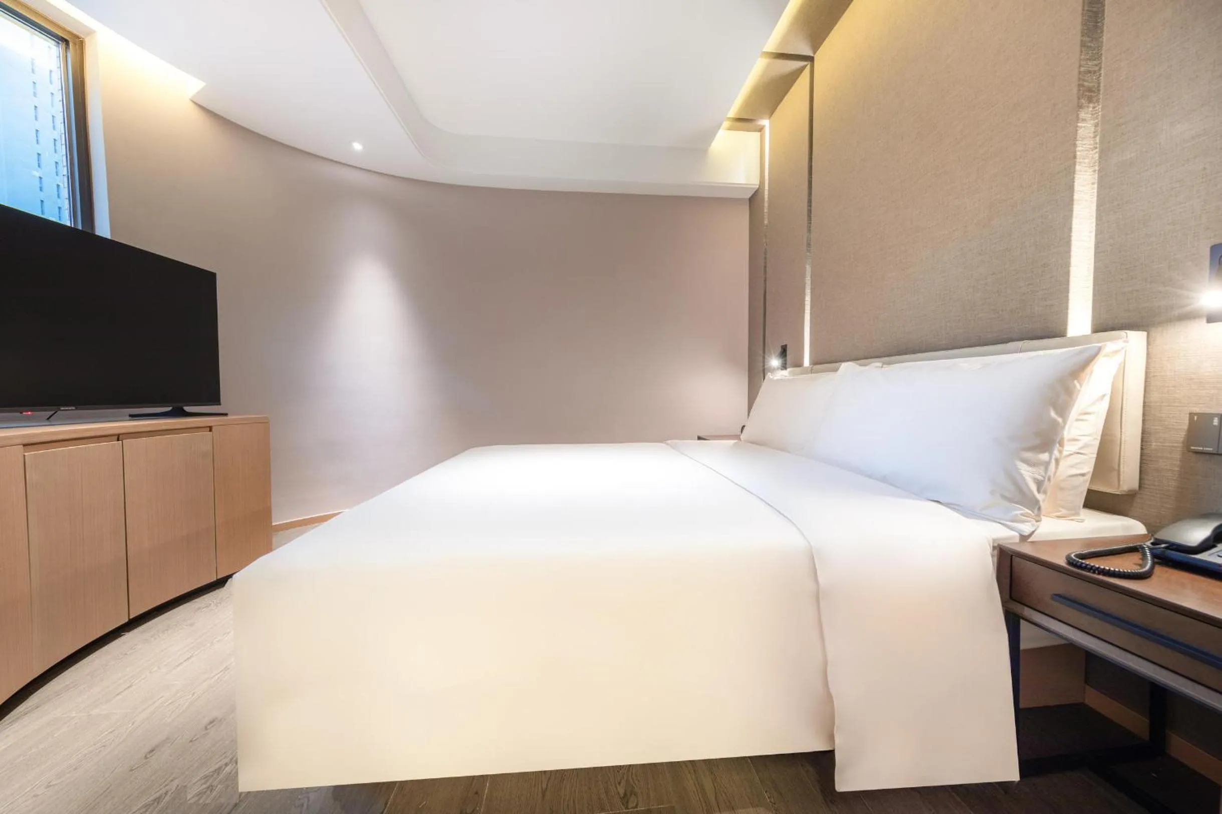 Bed in Atour Hotel Chongqing Jiangbei International Airport Huixing Light Rail Station