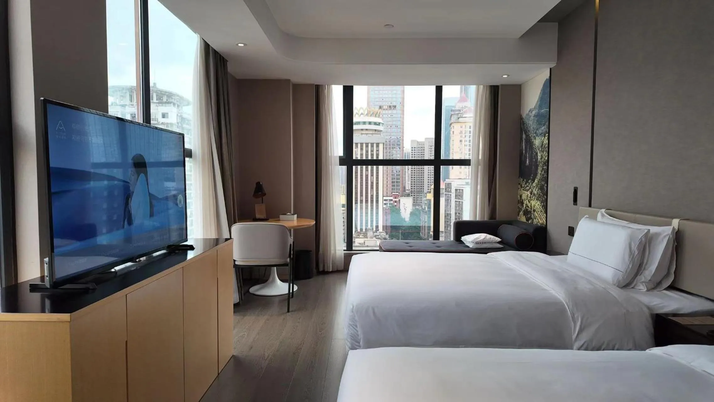 Photo of the whole room, Bed in Atour Hotel Chongqing Jiefangbei Raffles City Riverview