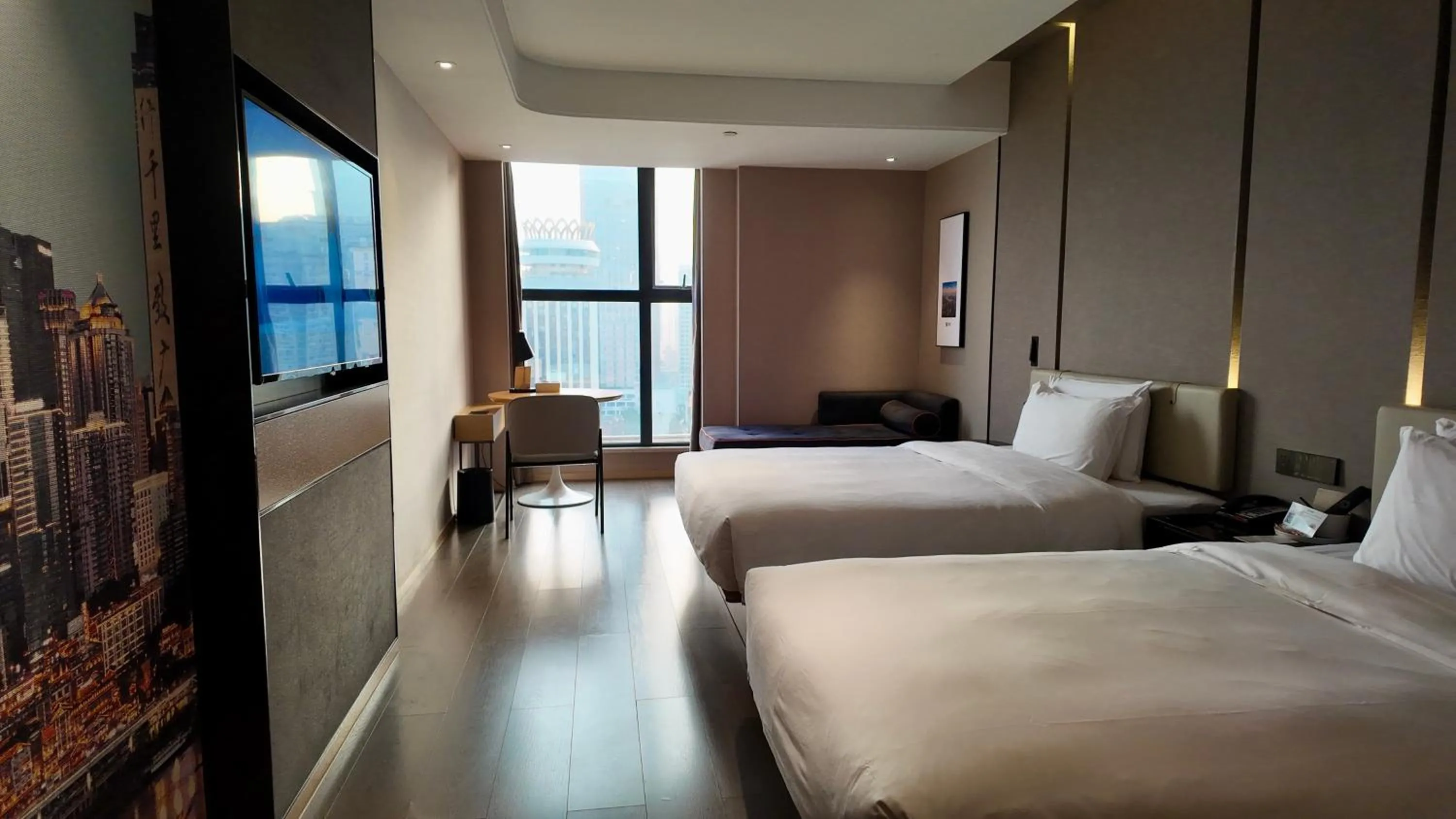 Photo of the whole room, Bed in Atour Hotel Chongqing Jiefangbei Raffles City Riverview