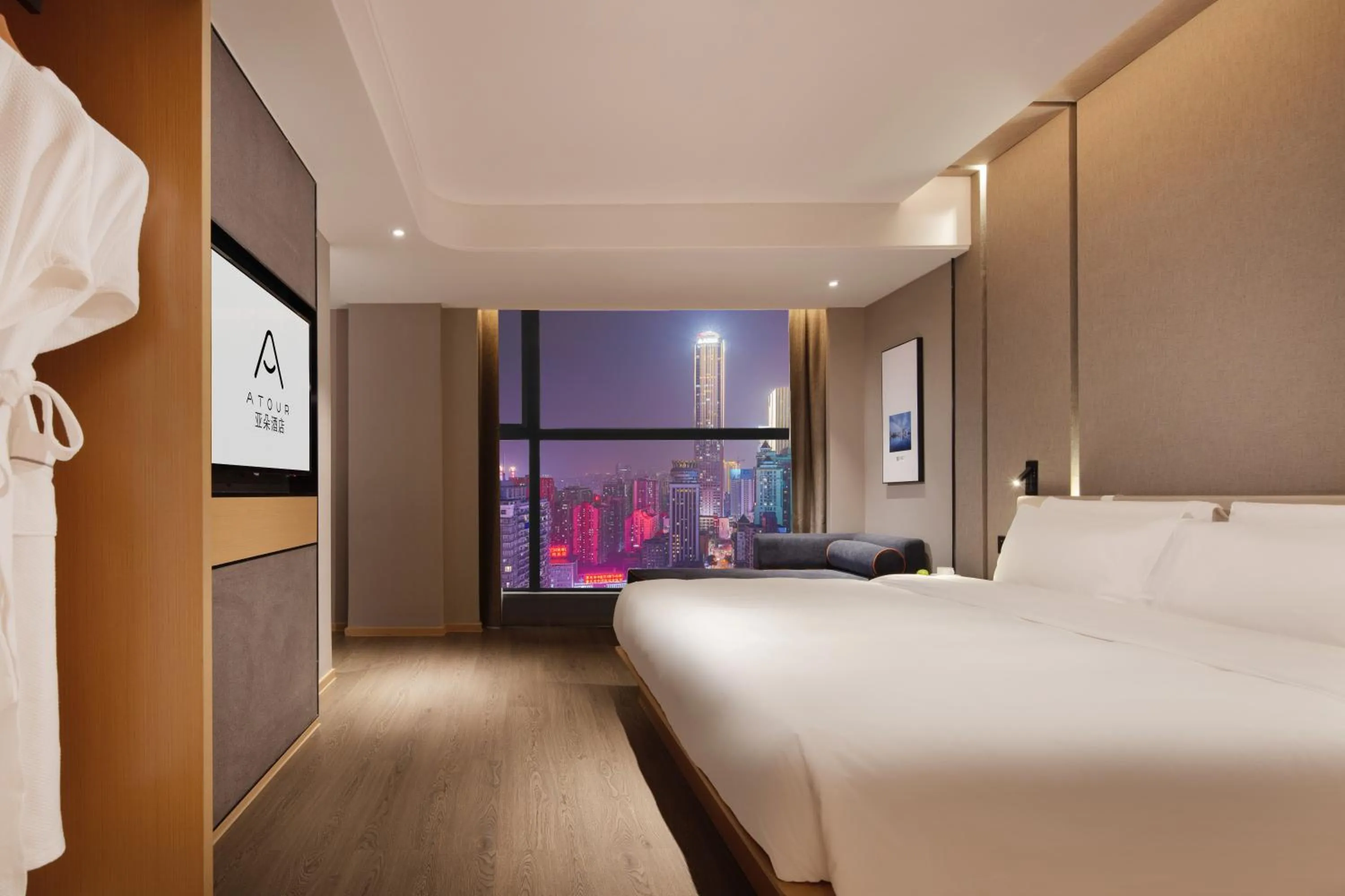Photo of the whole room, Bed in Atour Hotel Chongqing Jiefangbei Raffles City Riverview
