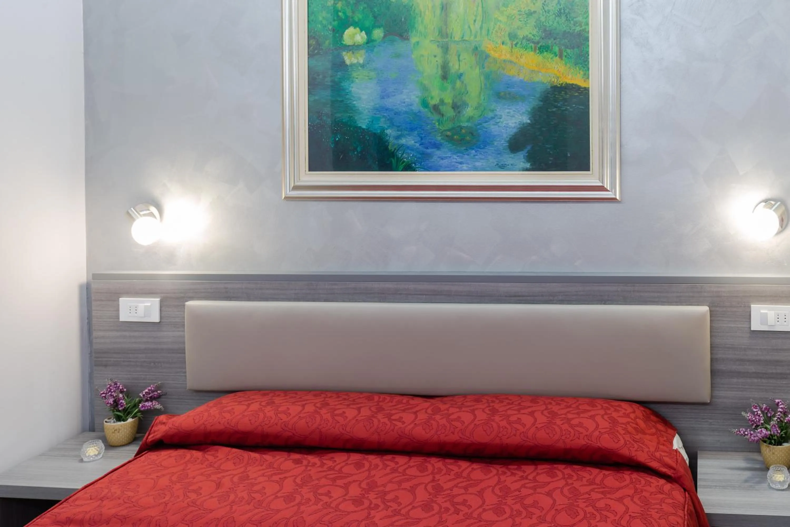 Bed in Affittacamere Alessia