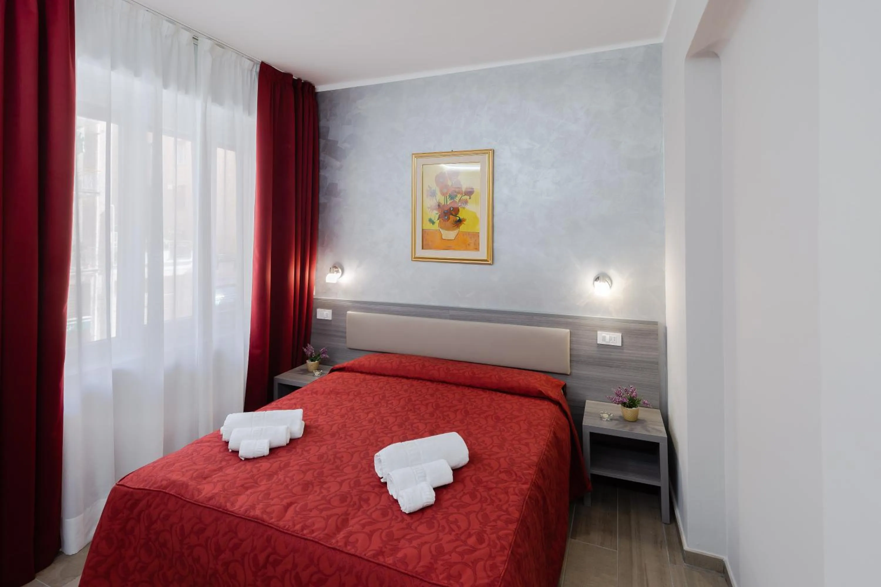 Bed in Affittacamere Alessia