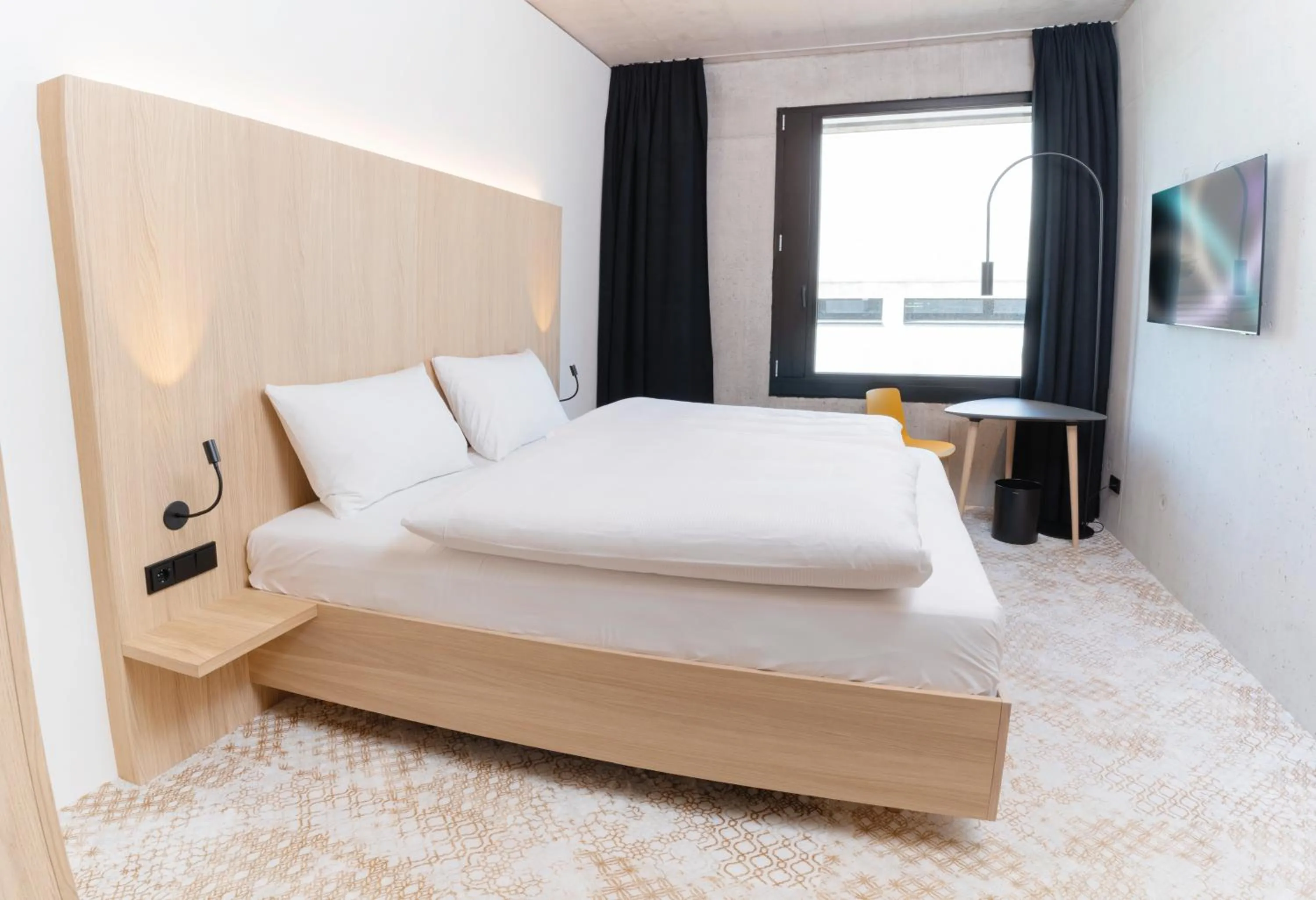 Bed in Boulderbar Hotel Self-Check in