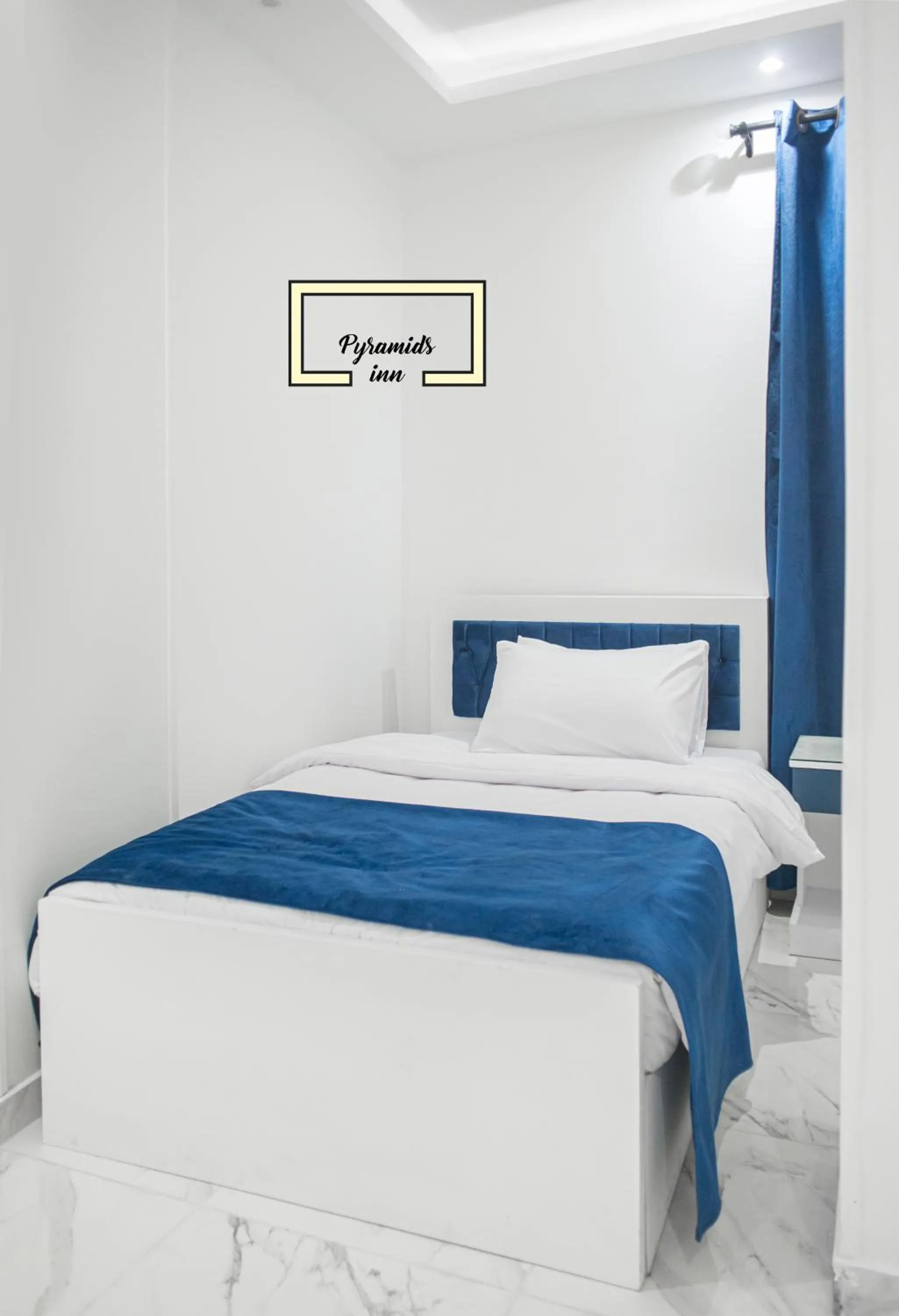 Bed in PR Pyramids Inn