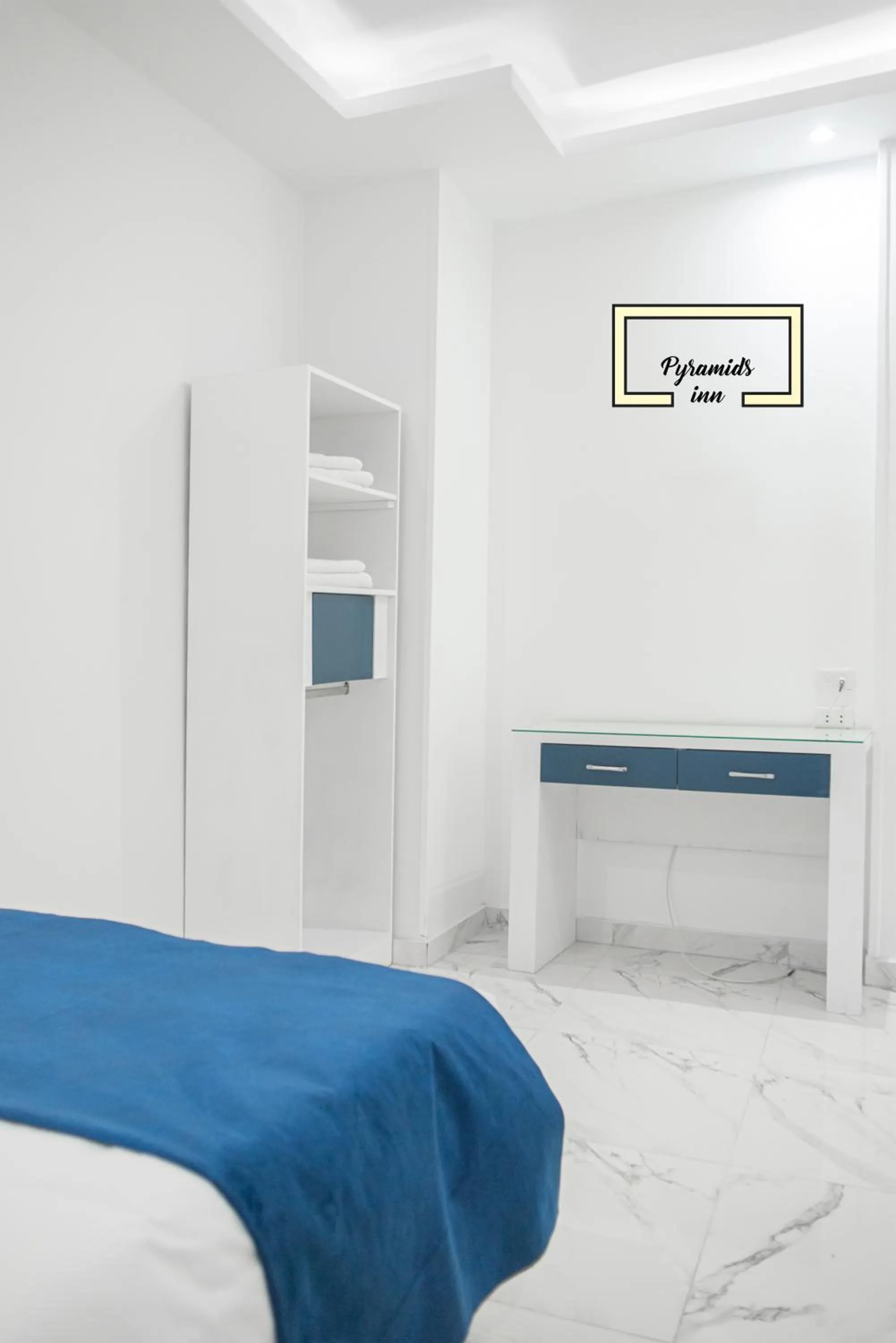 Bedroom in PR Pyramids Inn