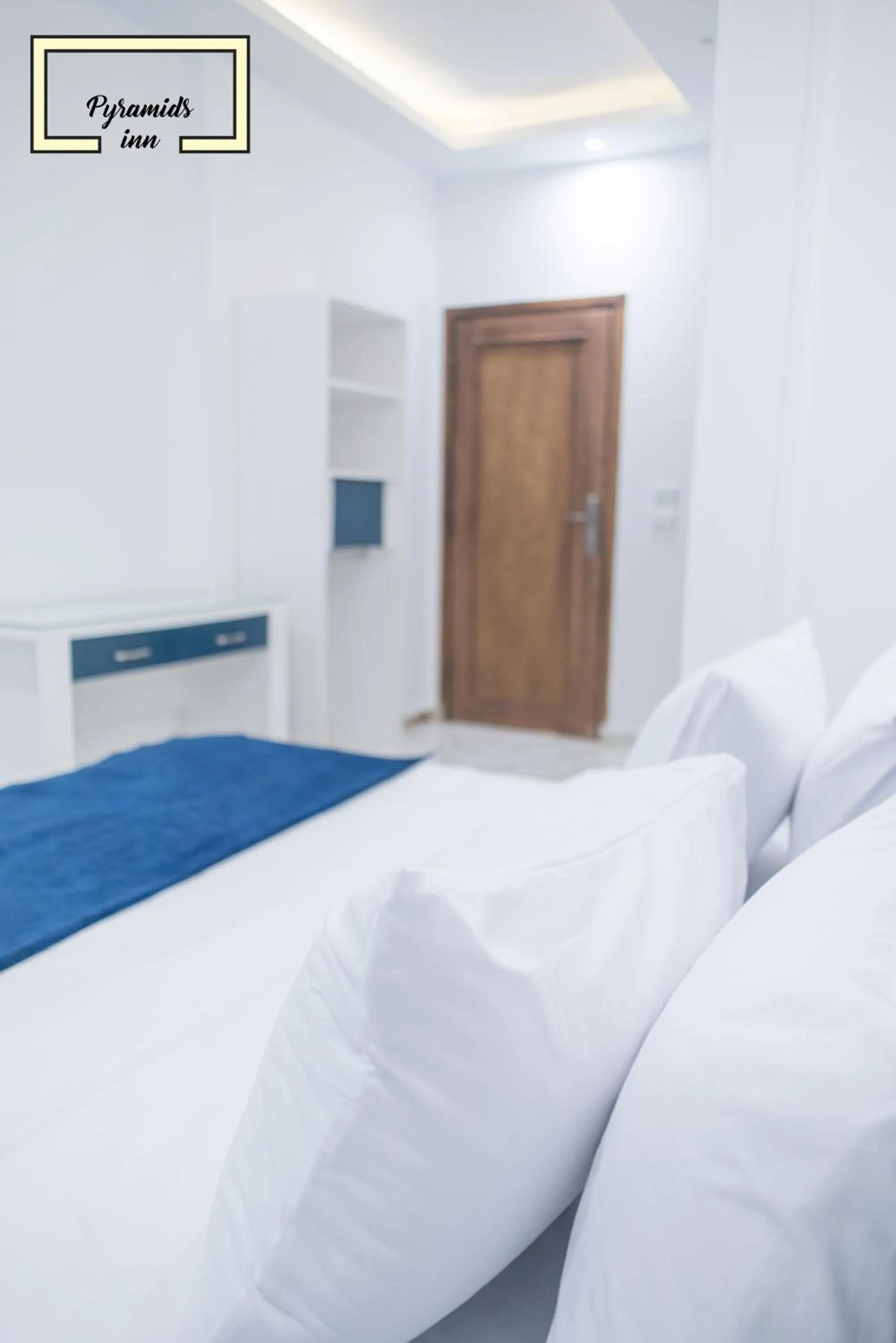 Bedroom in PR Pyramids Inn