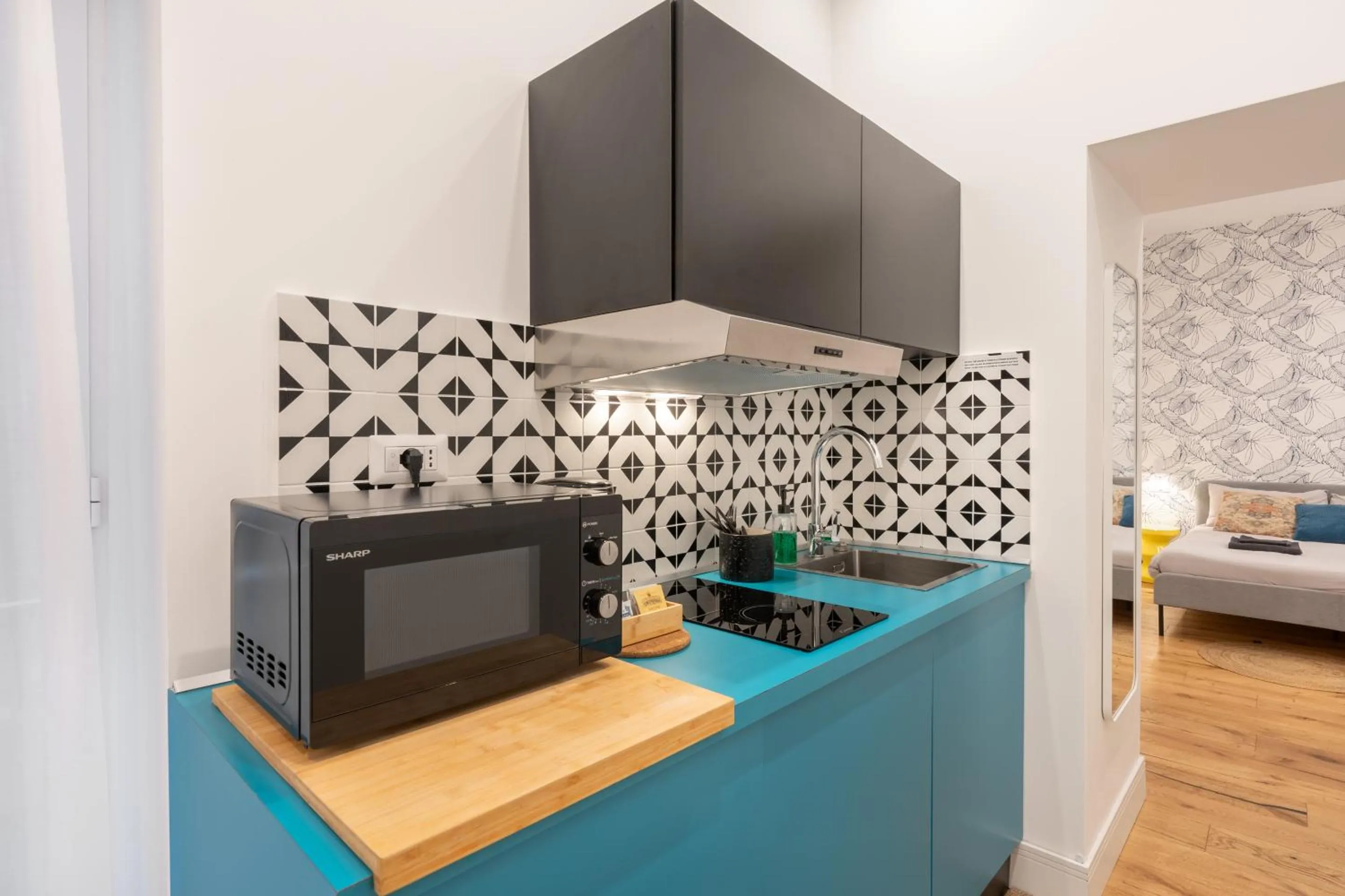 Kitchen or kitchenette, Bed in The Idyll Boutique apartment - Suite in Napoli's Spanish Quarters