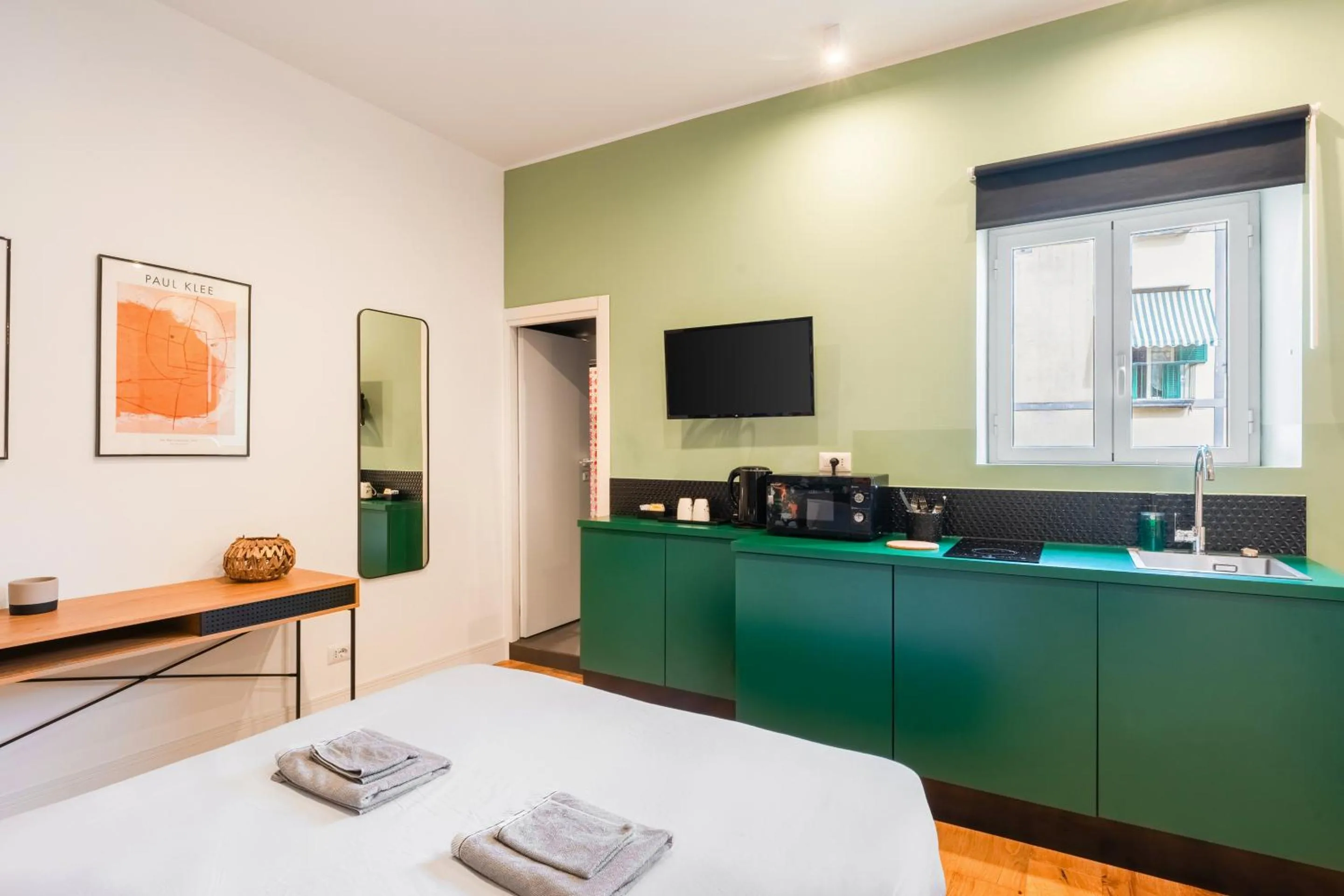 Kitchen or kitchenette, Bed in The Idyll Boutique apartment - Suite in Napoli's Spanish Quarters