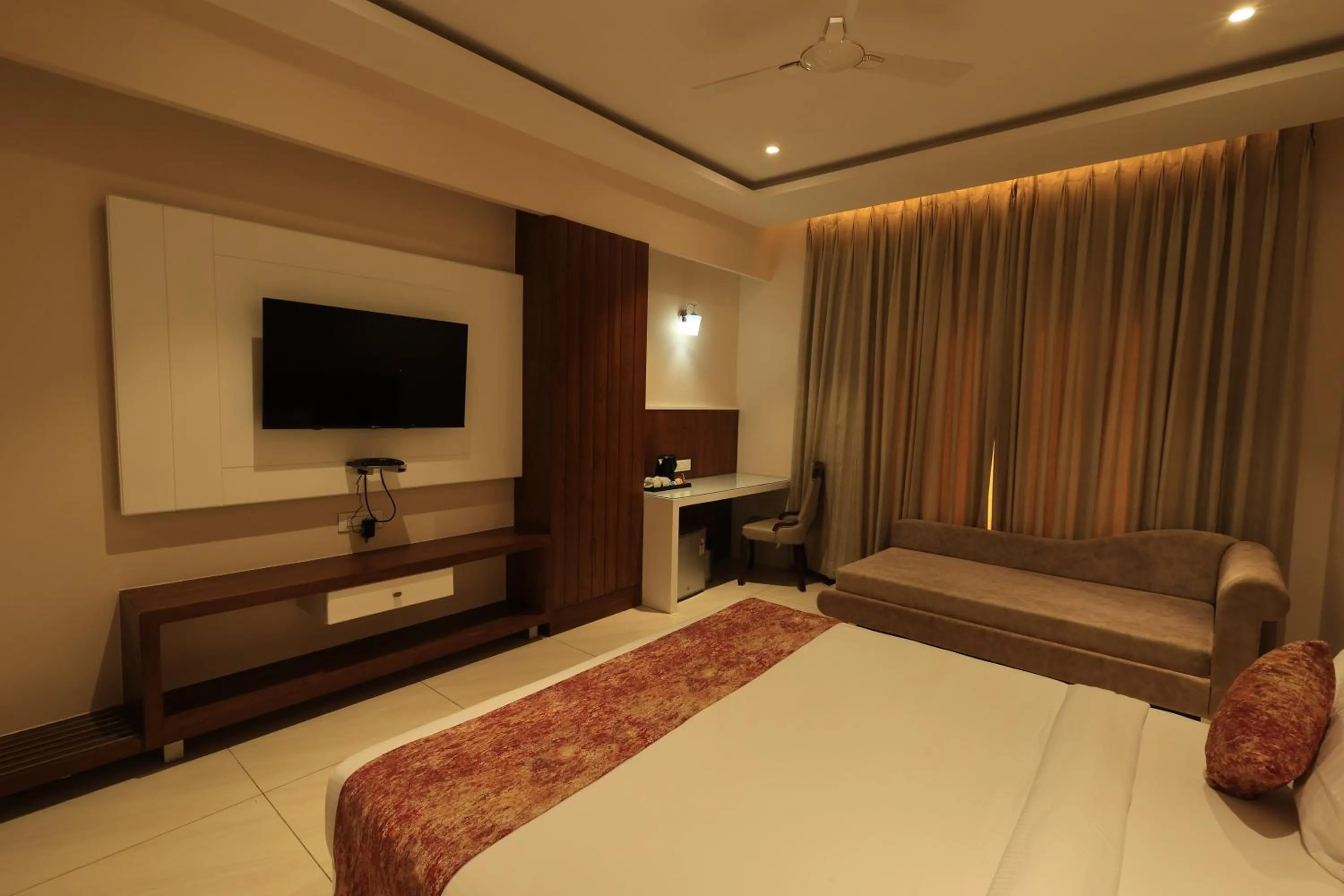Bed in Krishna Hotel And Resort