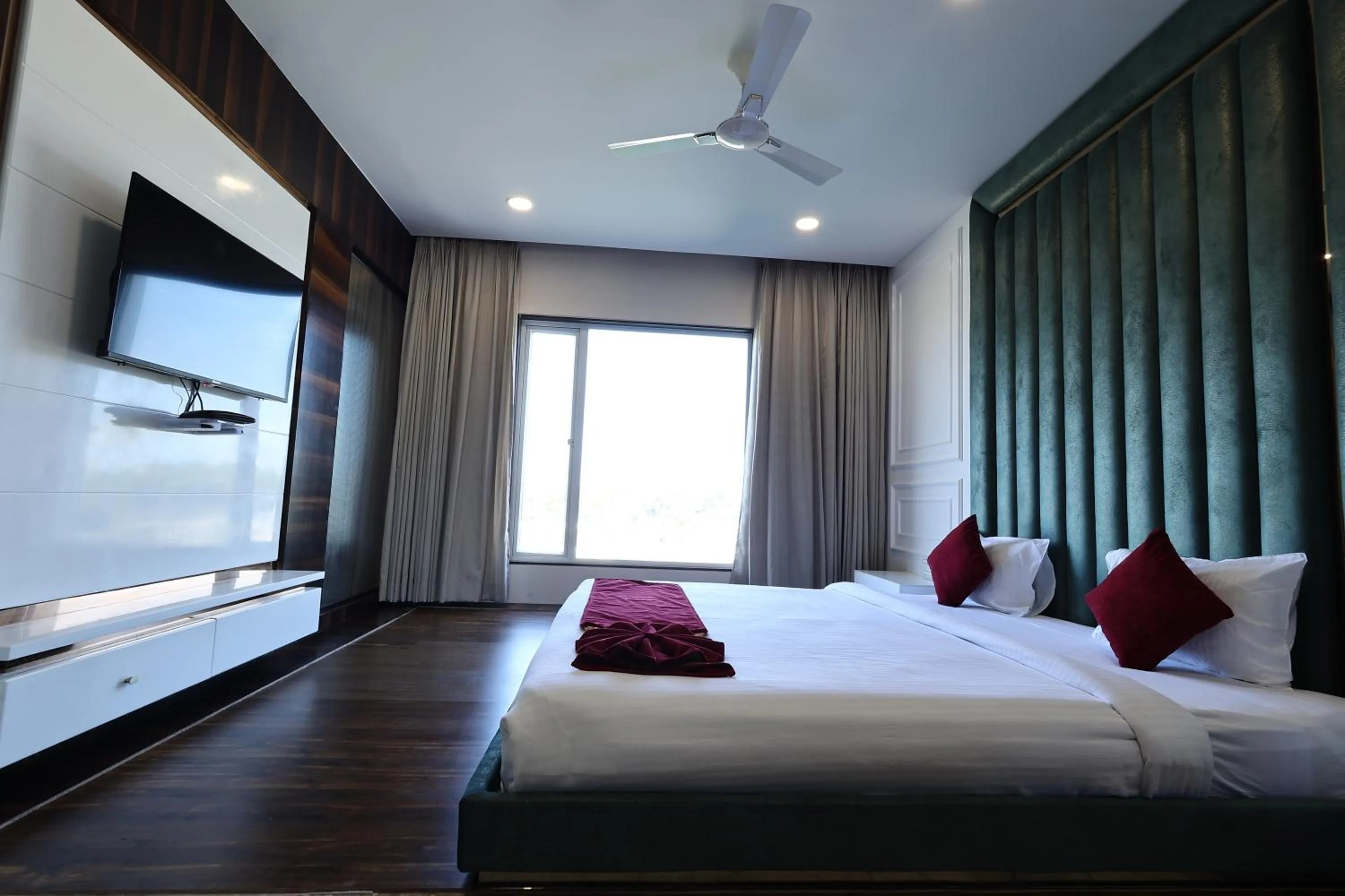 Bed in Krishna Hotel And Resort