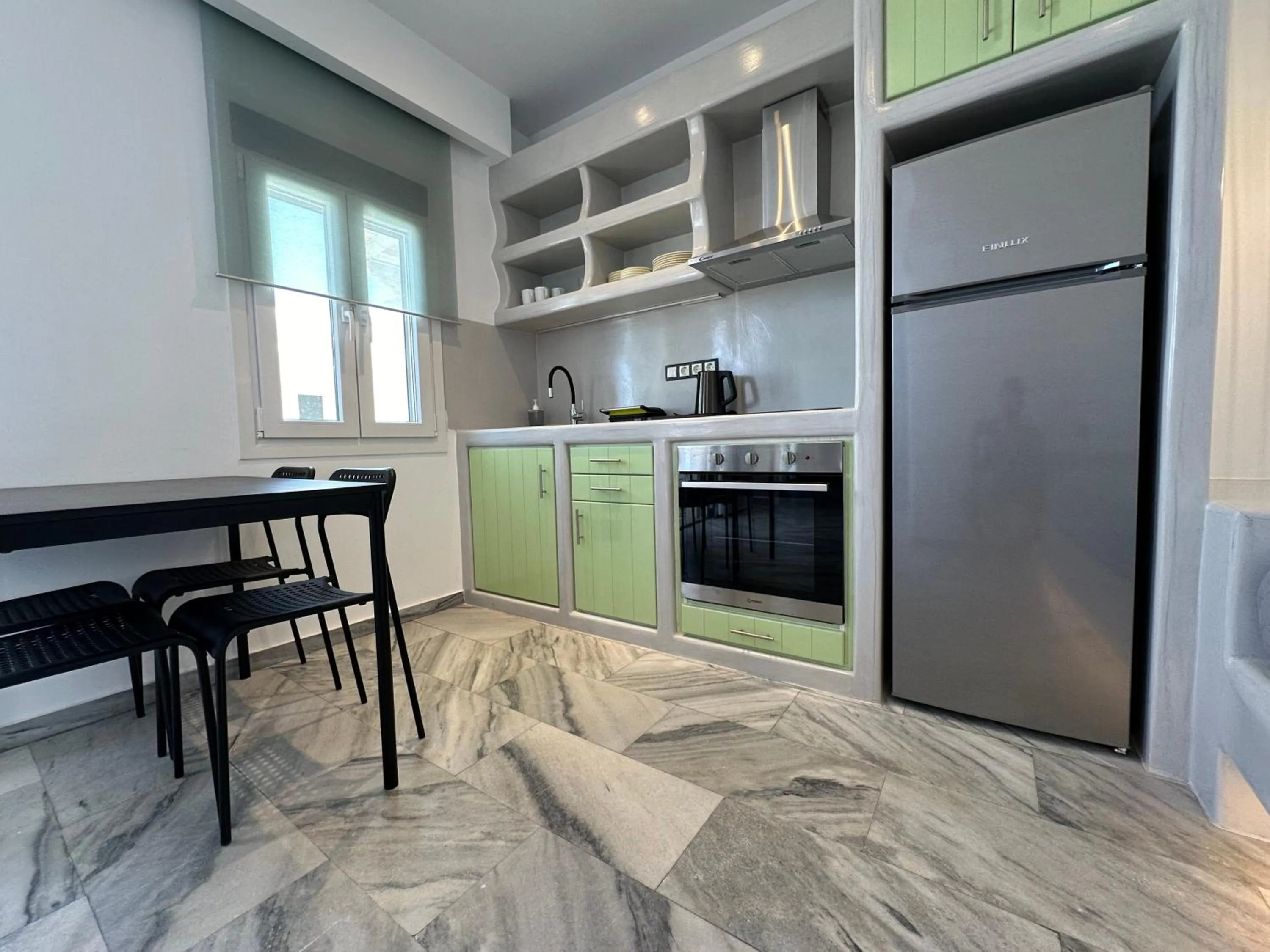 Kitchen or kitchenette in Aphrodite Hotel & Apartments