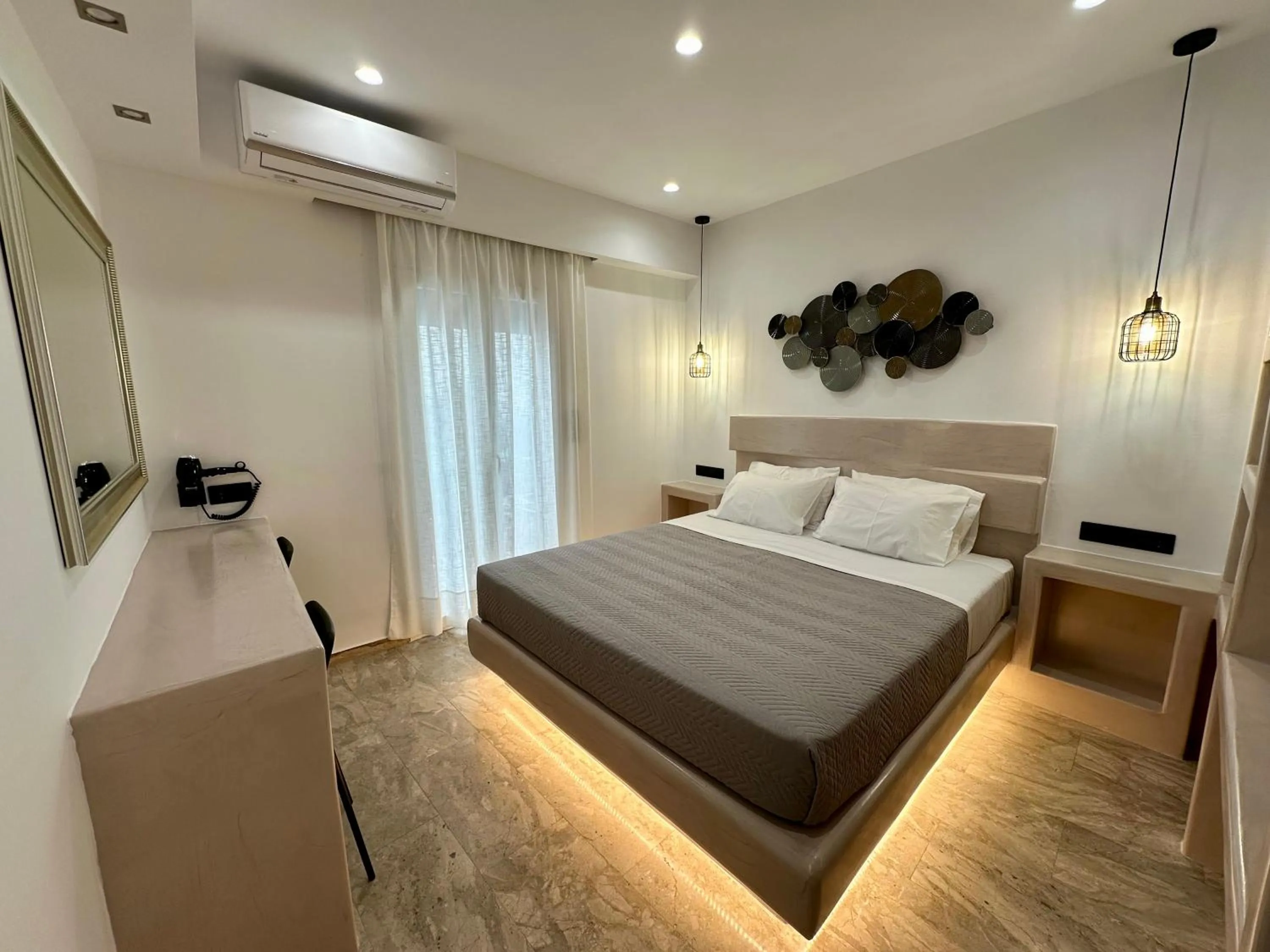 Bed in Aphrodite Hotel & Apartments